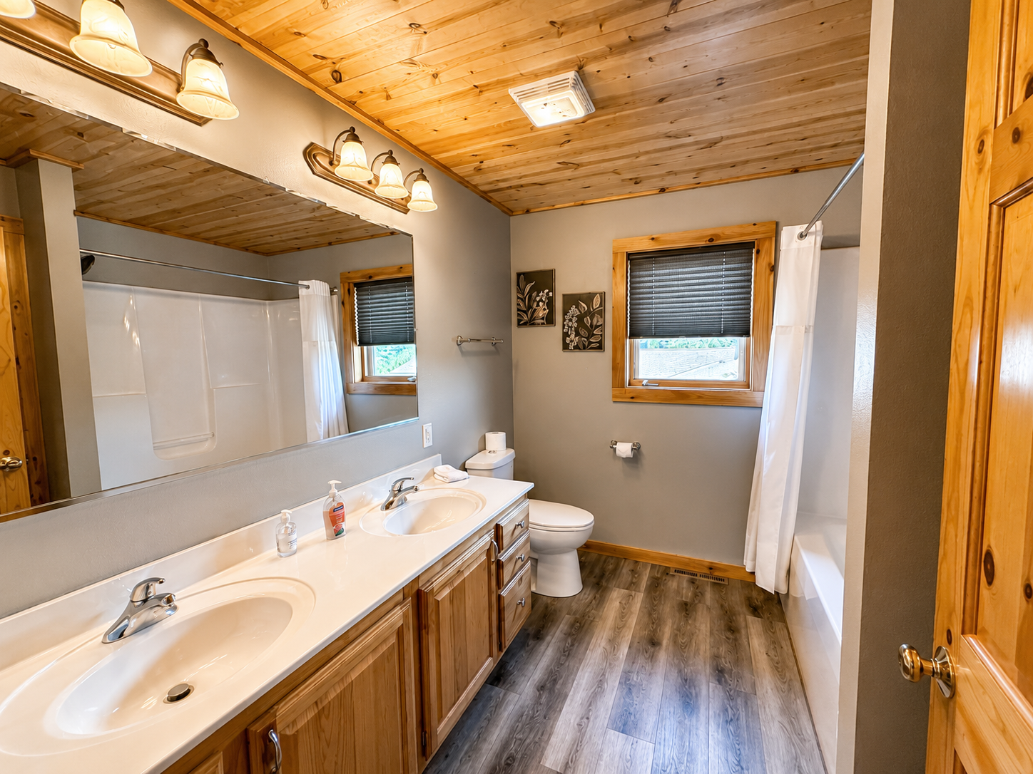 Spacious bathroom vanity provides plenty of counter space for getting ready during family and group stays. 