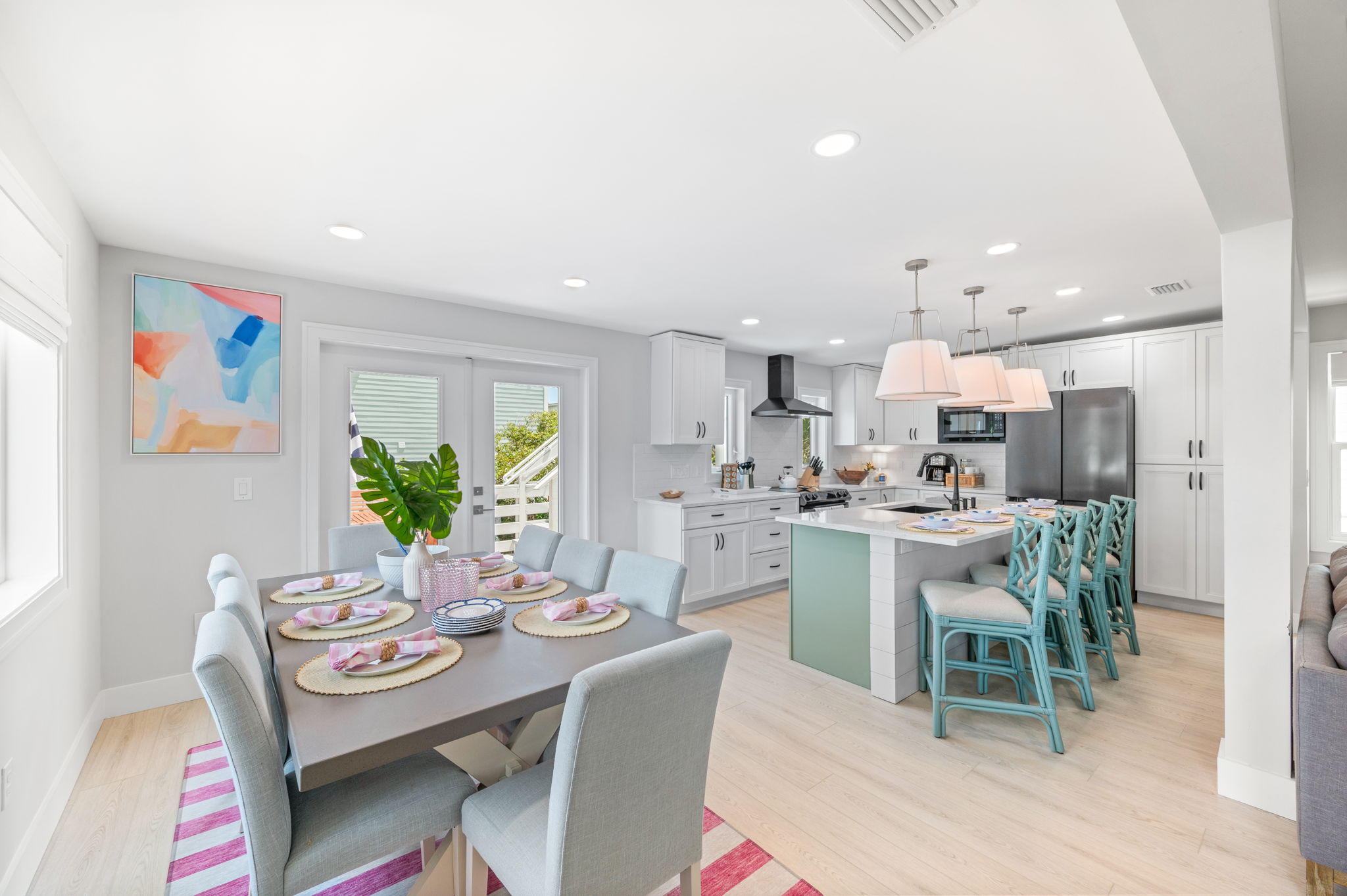 The open kitchen and eating area allow for 12 guests to eat together comfortably