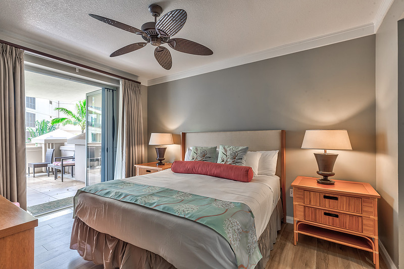 Primary bedroom which opens to the expansive lanai. 