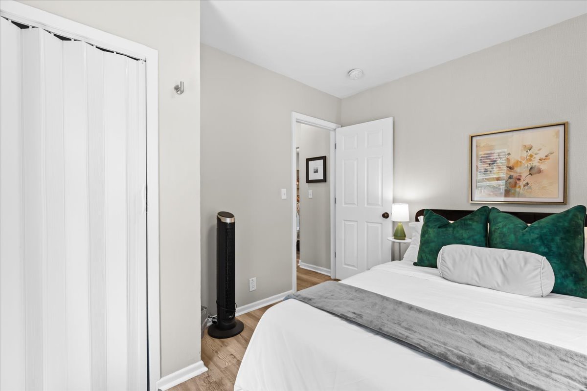 Spacious bedroom with storage and clean, minimalist style