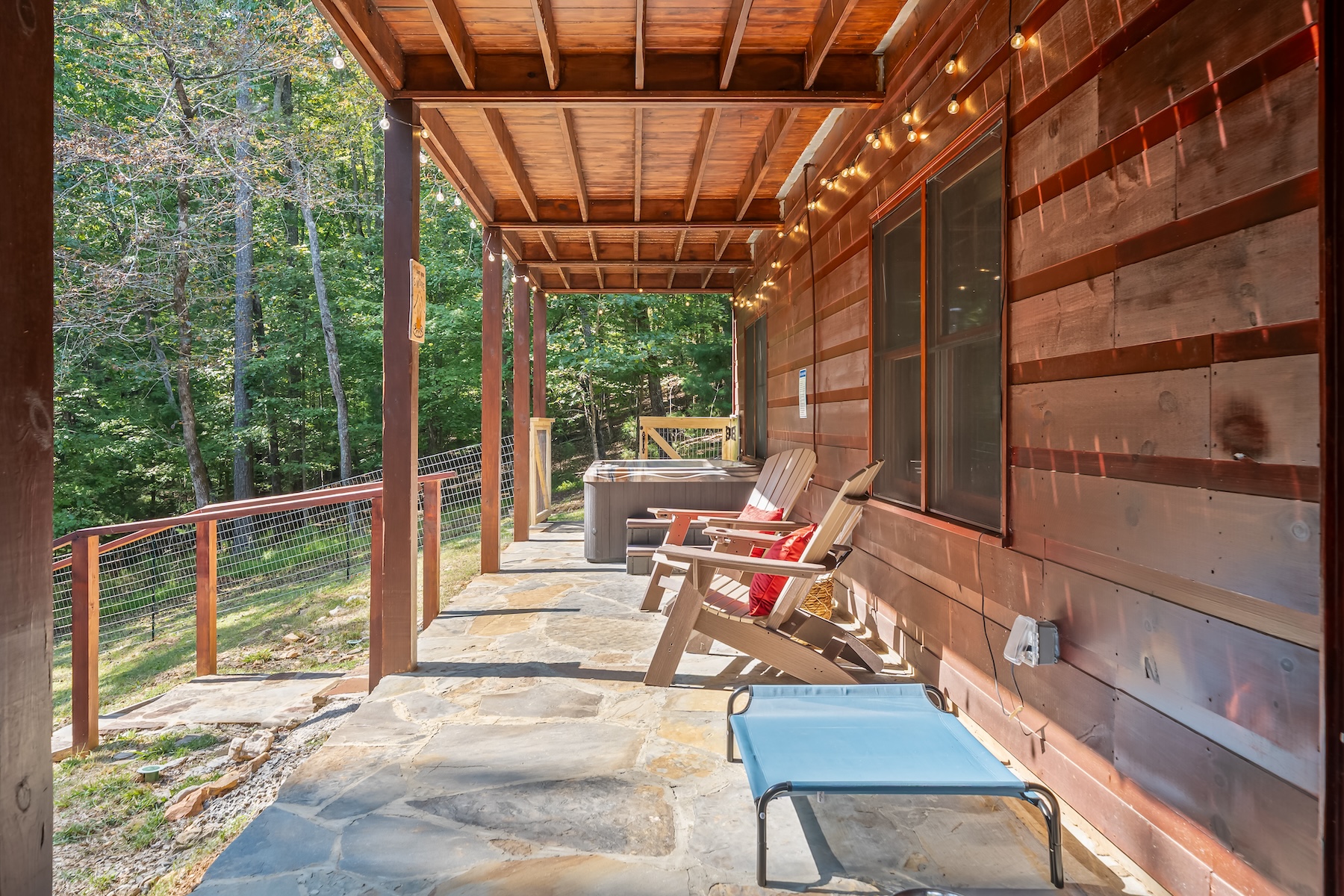 Watch your fur babies play, run, play with their toys and/or enjoy some time in the bubbling hot tub. A deer trail leads right behind the cabin. So neat!