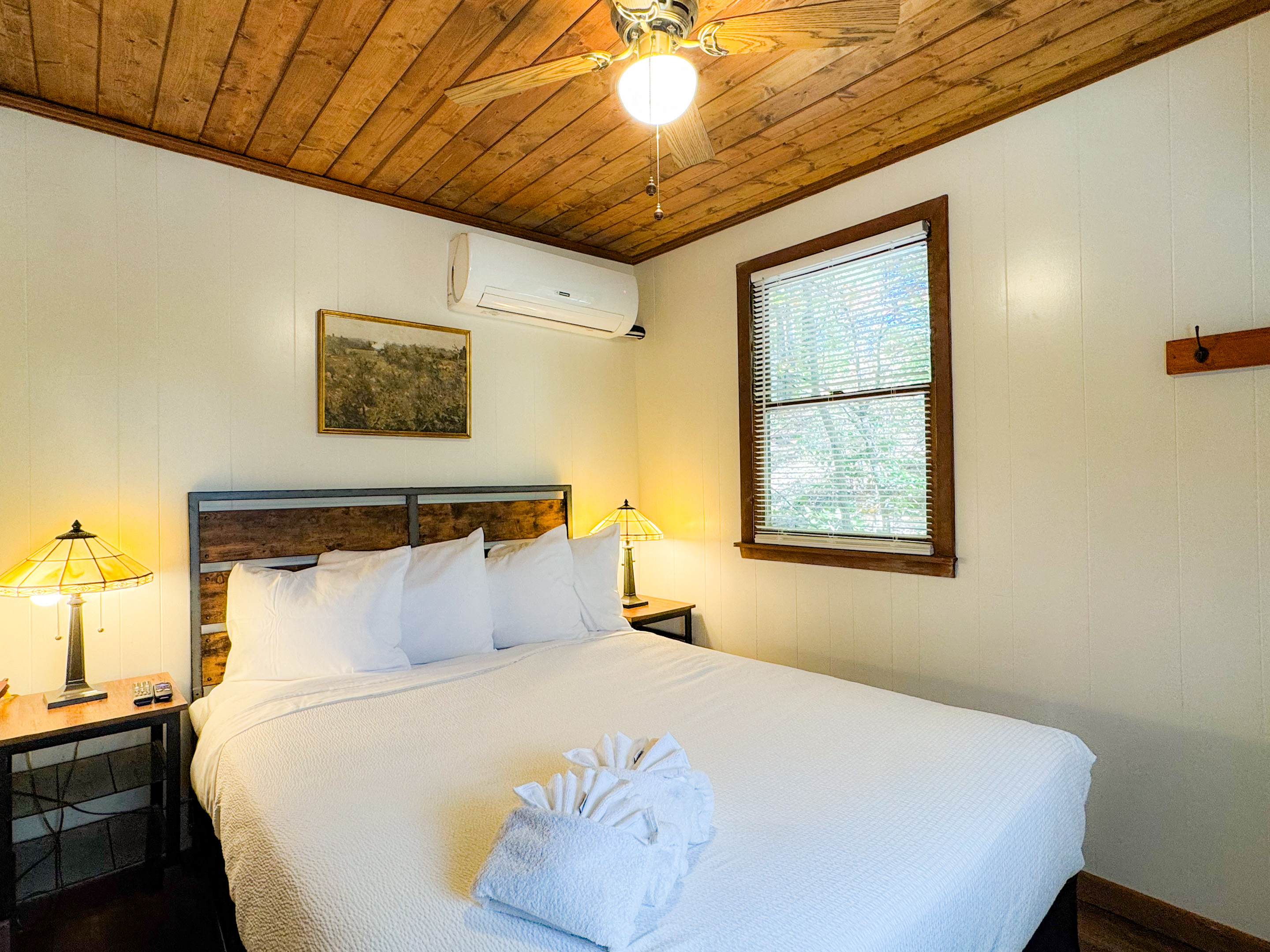 Bedroom one with a queen bed