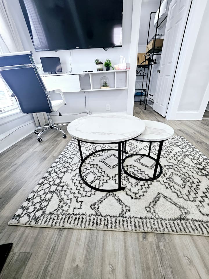 Coffee tables and plush rug