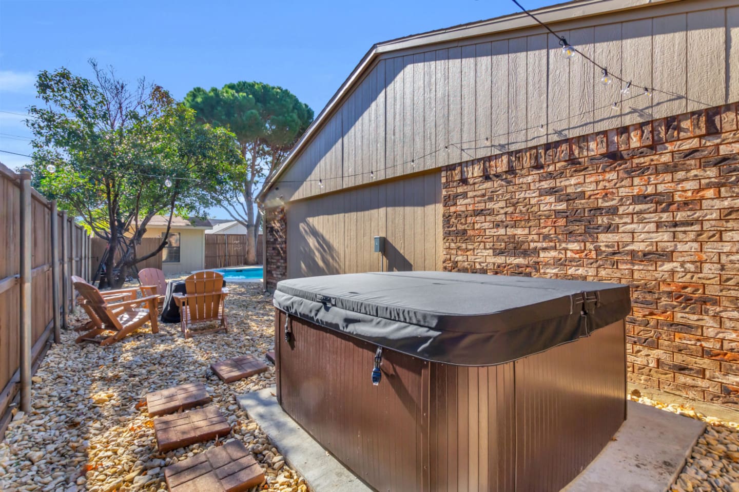 Get warm in the jacuzzi or by the fire pit. This patio outdoor area is a cozy retreat for morning coffee or late-night relaxation. A guest favorite for staycations and weekend getaways.