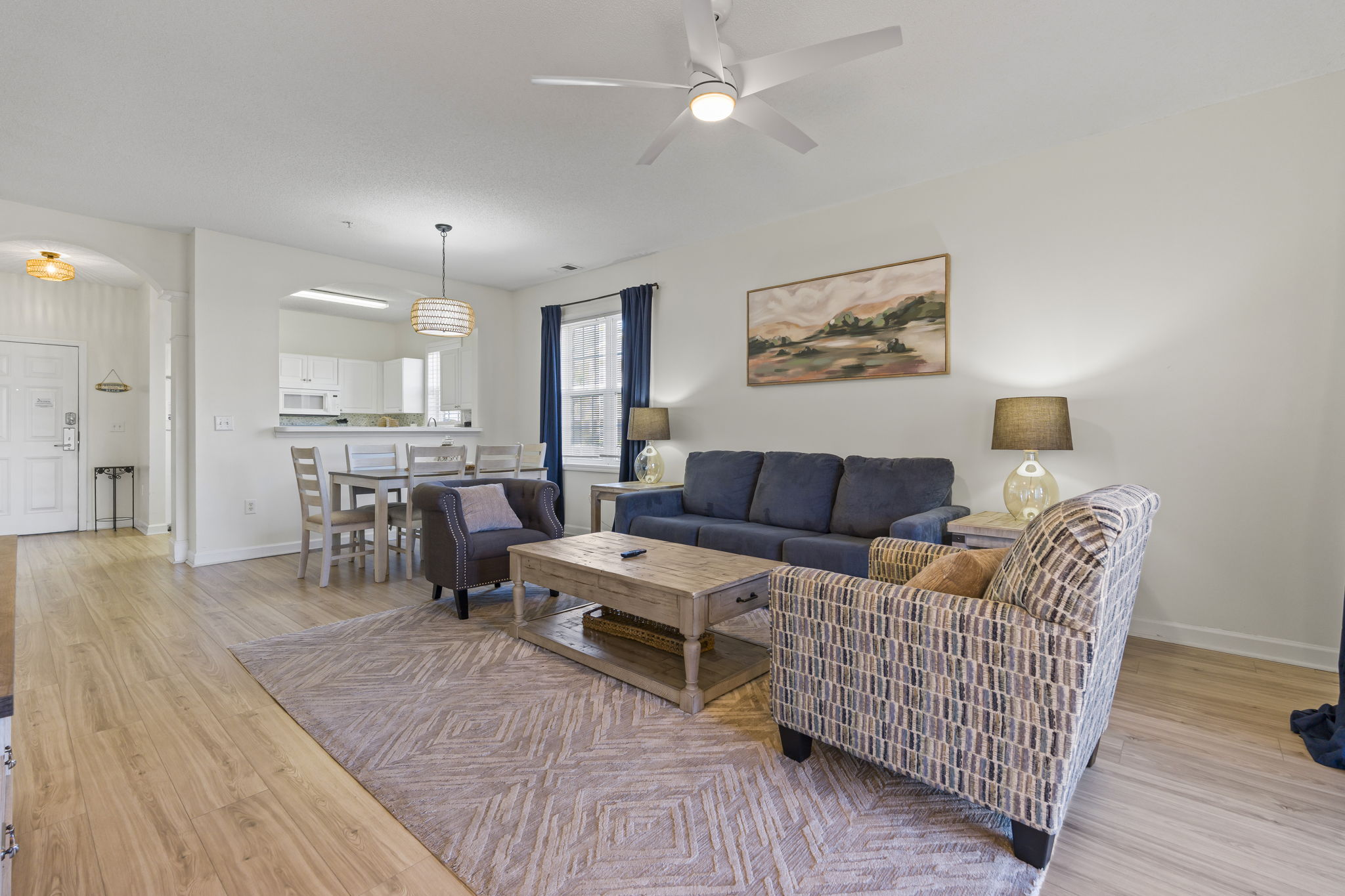 Spacious and thoughtfully designed living room with sleeper sofa
