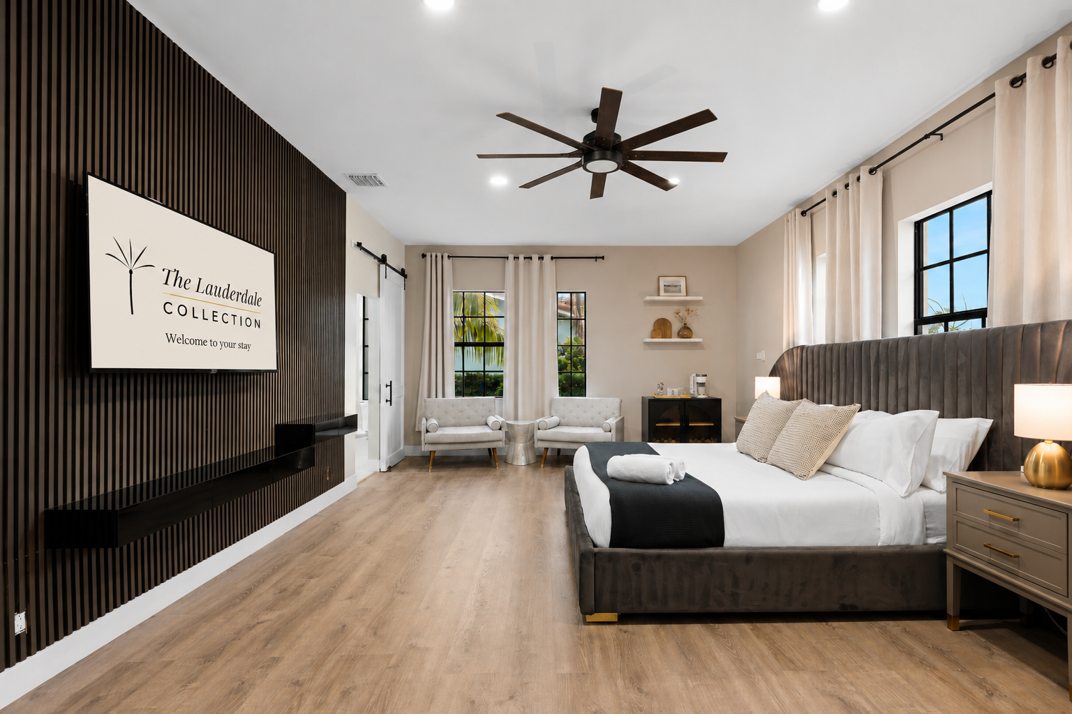🛌 Downstairs master suite with 65" TV, cozy chairs, and your own coffee station to start off each day.