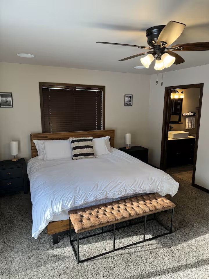 Luxury king master suite with private bath - your peaceful retreat after a full day.