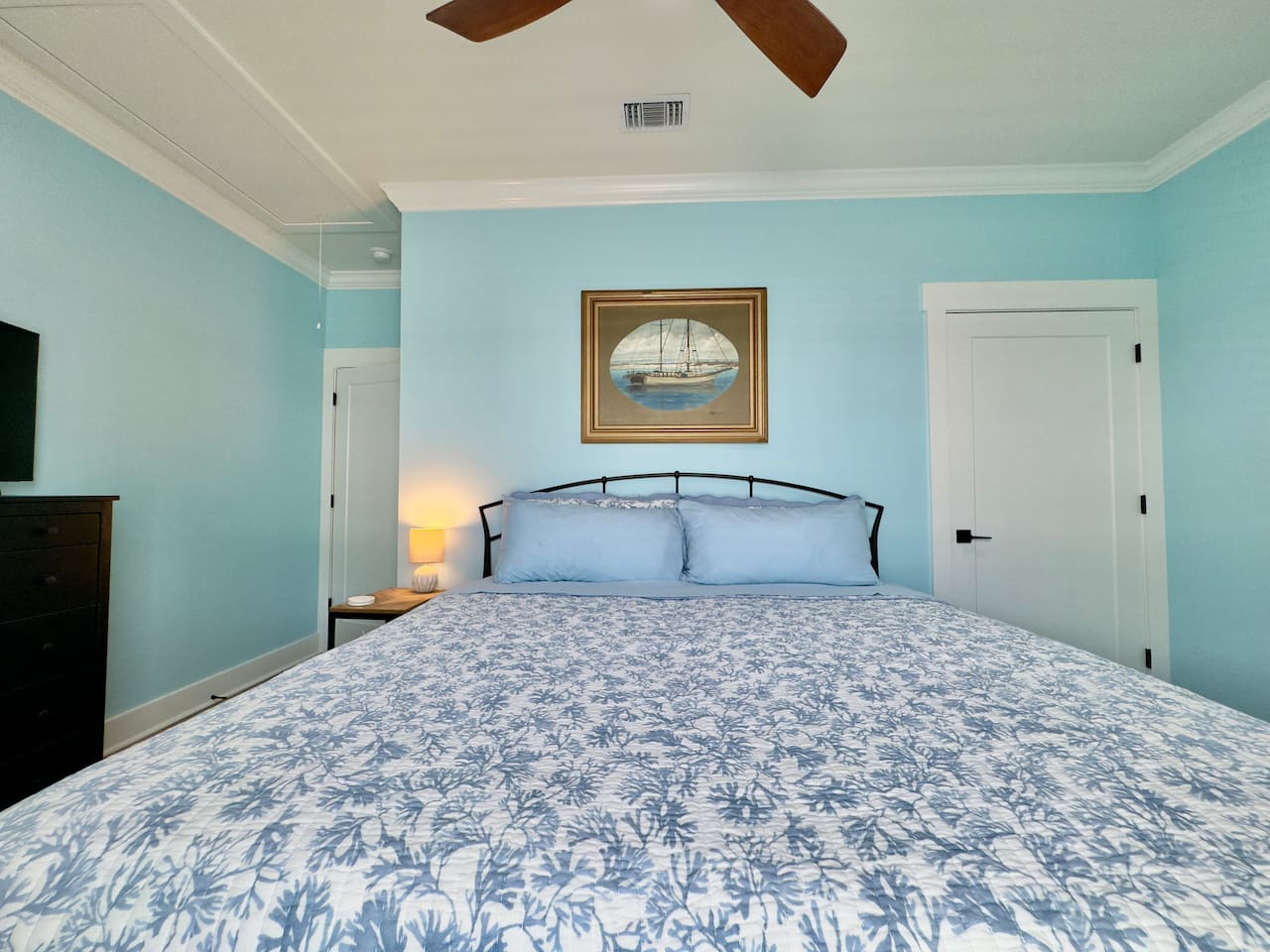 This welcoming bedroom offers comfort, light, and simplicity.
