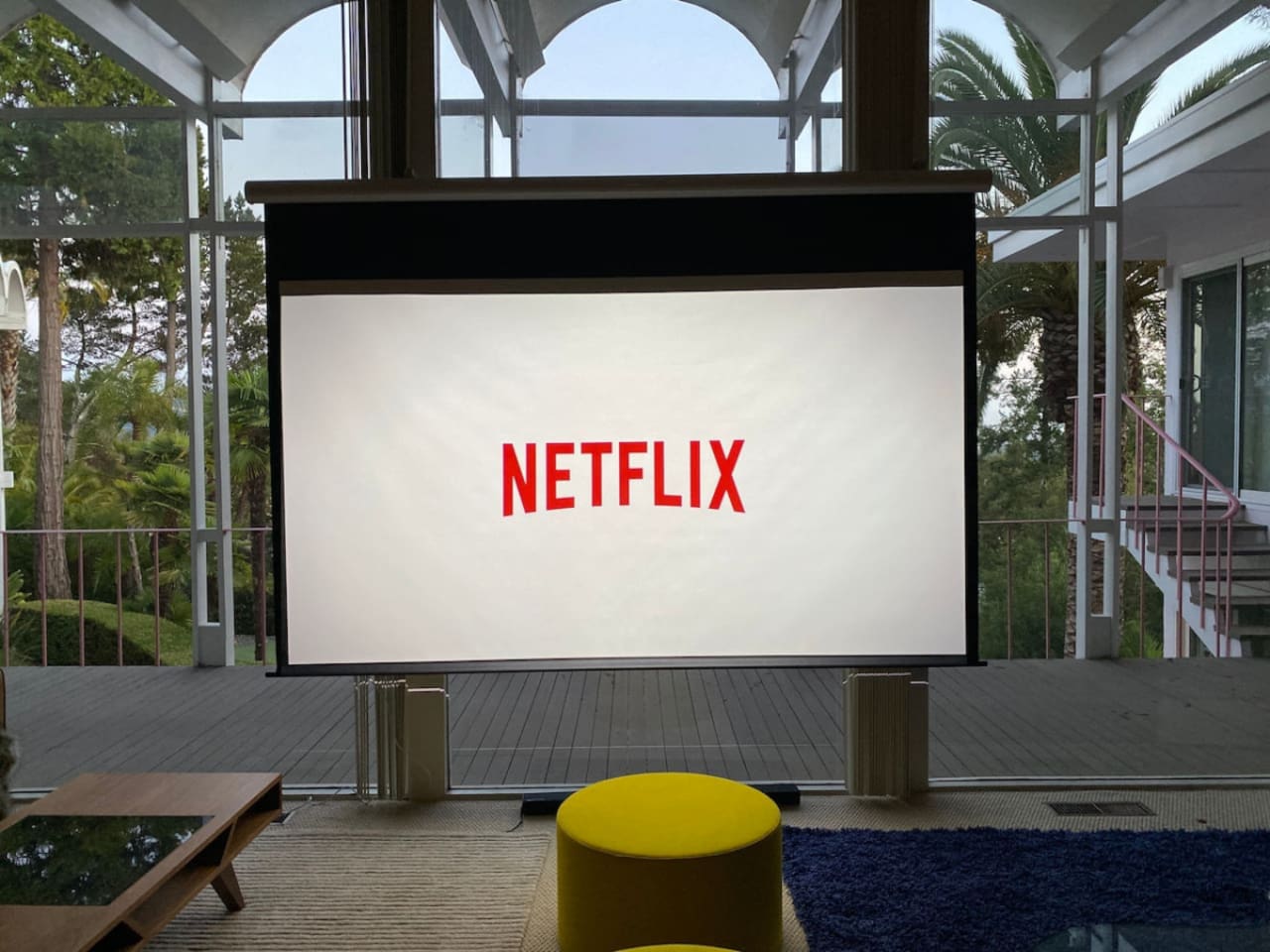 "Hidden" 4k projector and 120" projector screen. Built-in sound sound theater system.