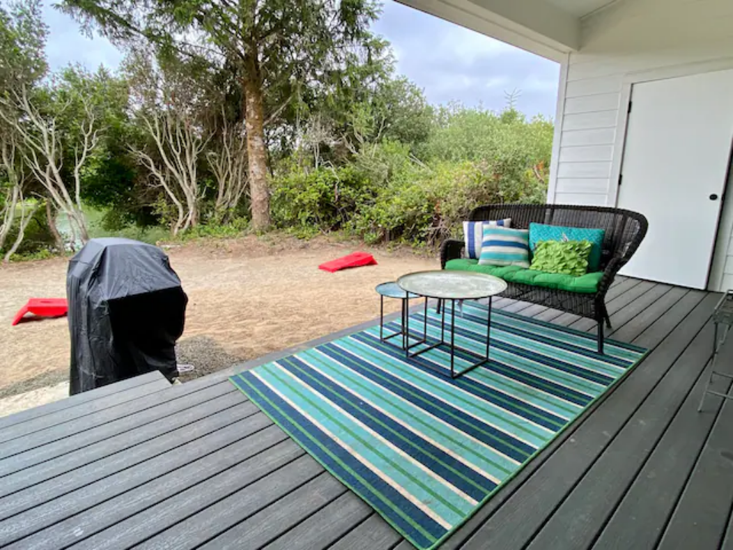 Fire up the grill and settle onto the deck — dinner outside is the plan most nights here.