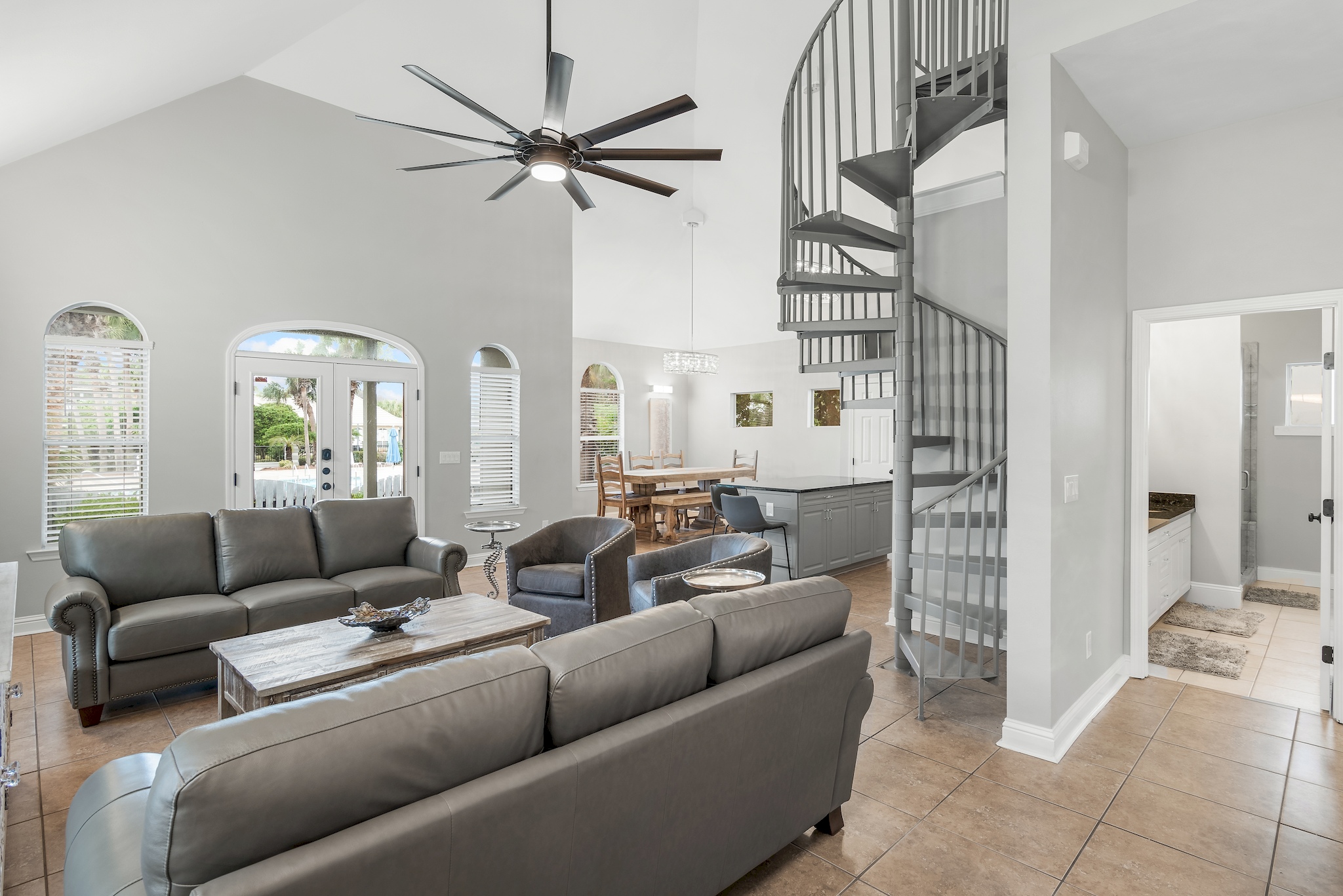 Open living area with comfortable seating and Gulf‑inspired artwork