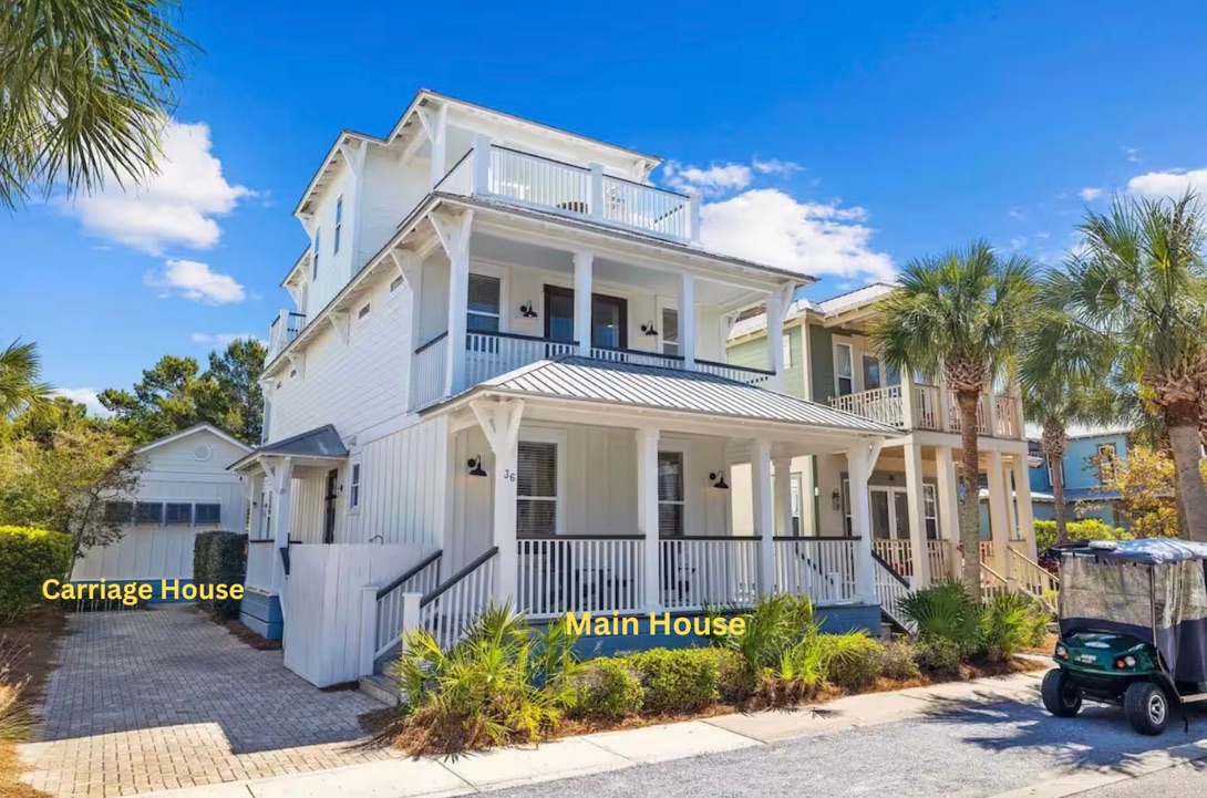 Bright 3-story home with separate carriage house, multiple porches and walkable access to the beach, pool, green space, restaurants and shops.