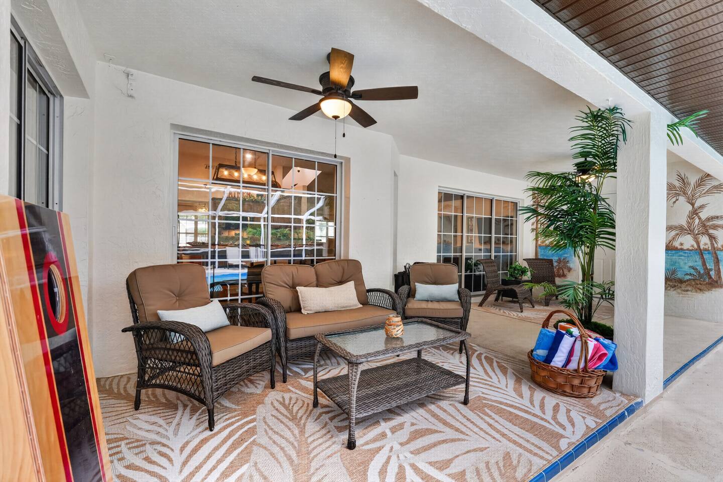 Our screened lanai is comfortable with plenty of seating and fans to keep you cool.  