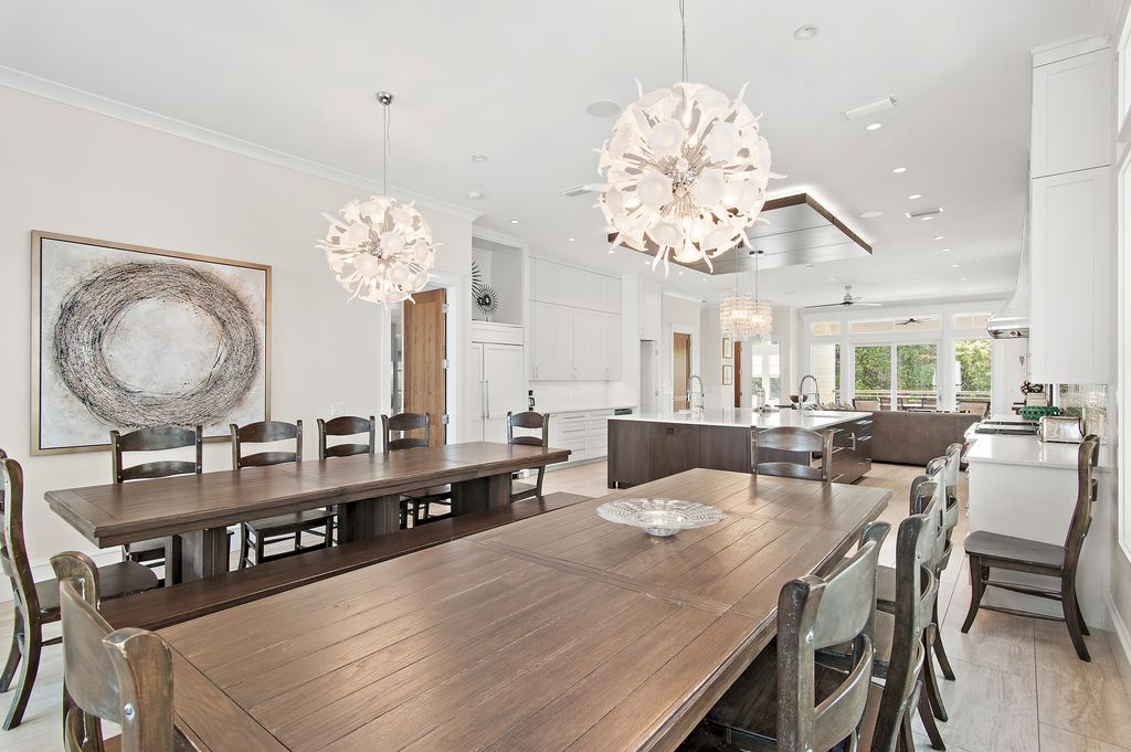 Bright, spacious dining with balcony access. Seats 20 +