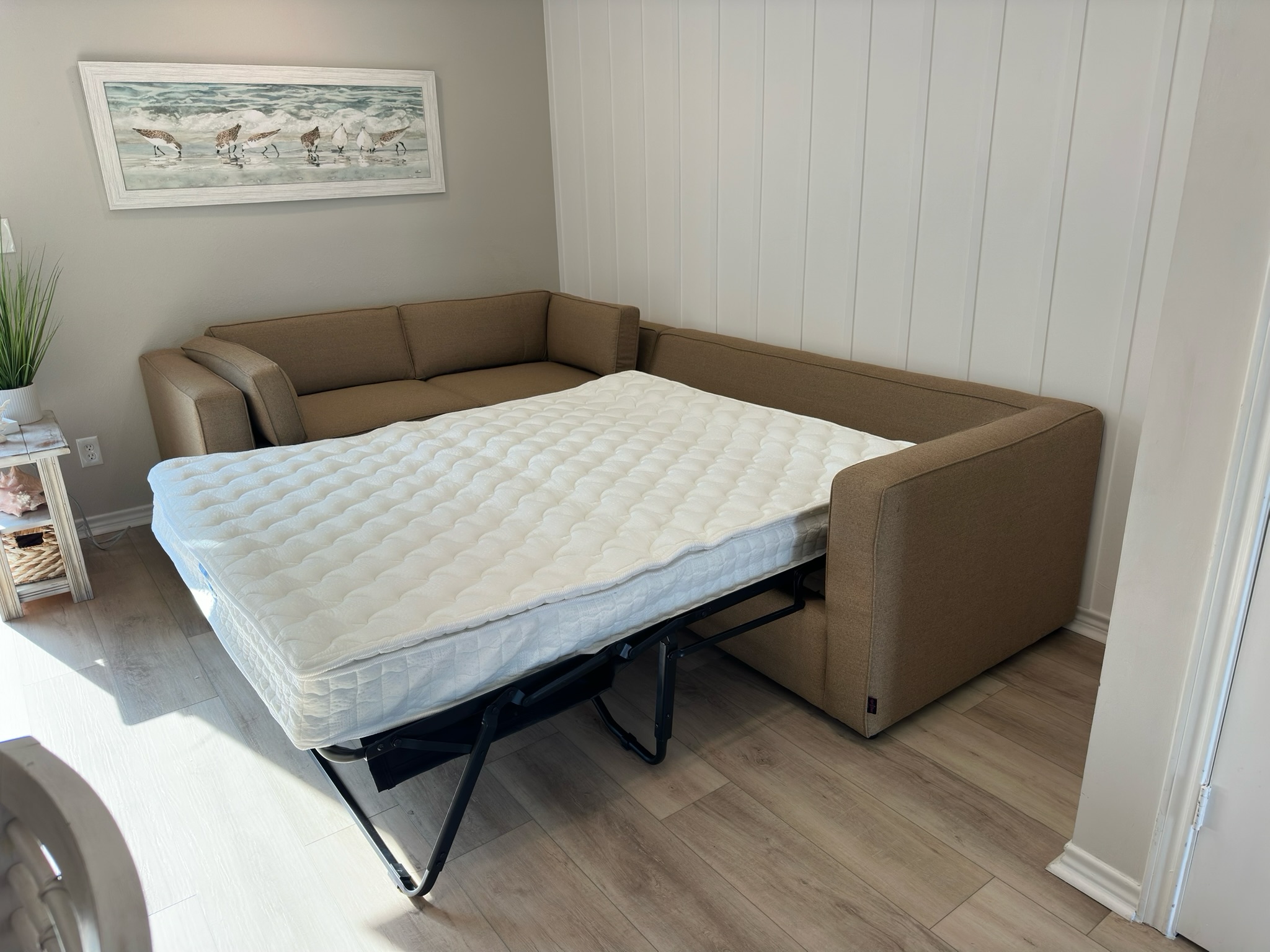 Unfolds into a cozy queen bed