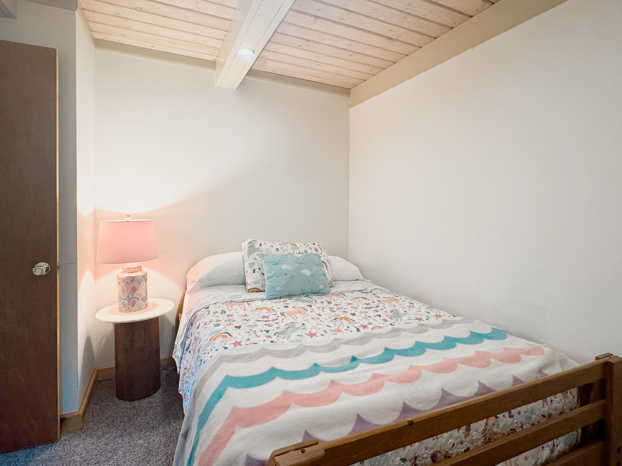 Main floor bedroom with standard full sized mattress