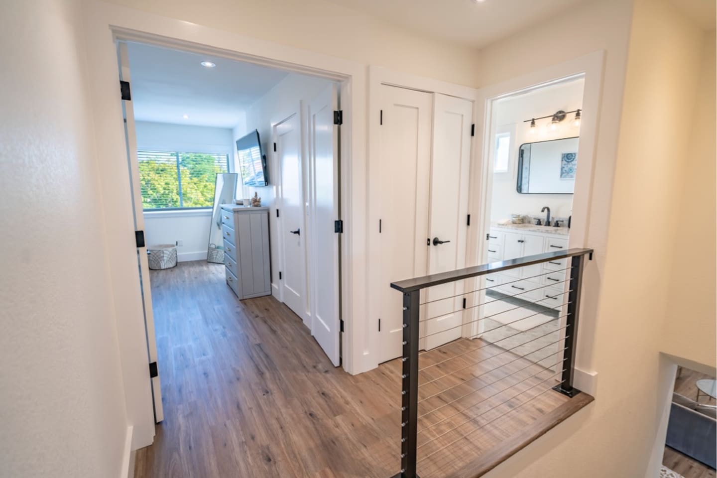 Upstairs Hallway to Master Suite & Shared Bathroom