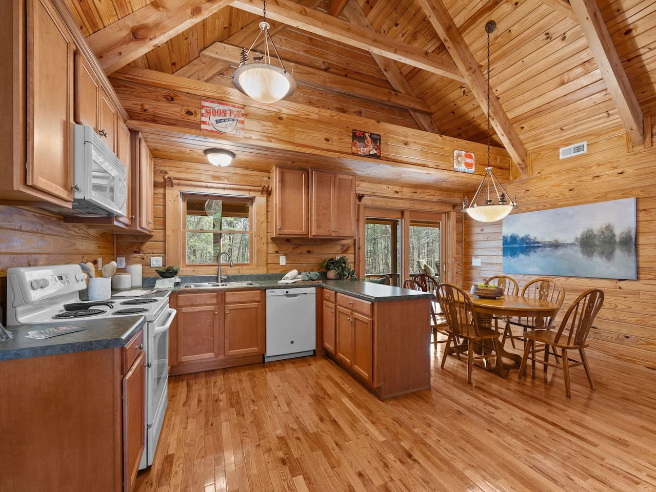 Fully stocked kitchen - open - dining room 