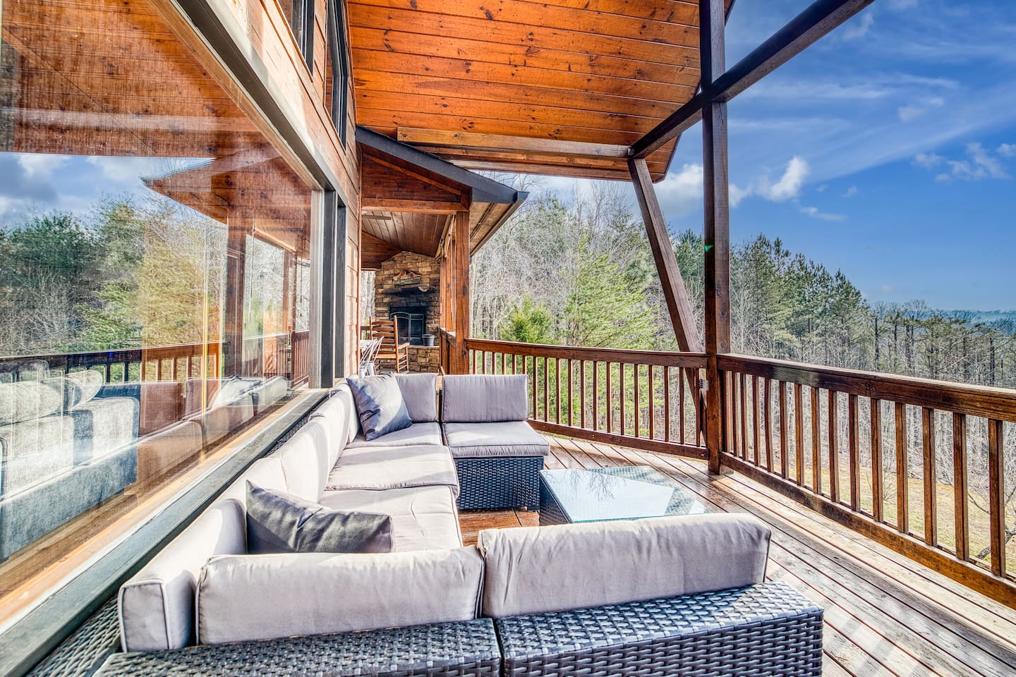 Mountain views from the wrap-around porch, large outdoor couch on the back deck a-frame overlooking the back yard! 