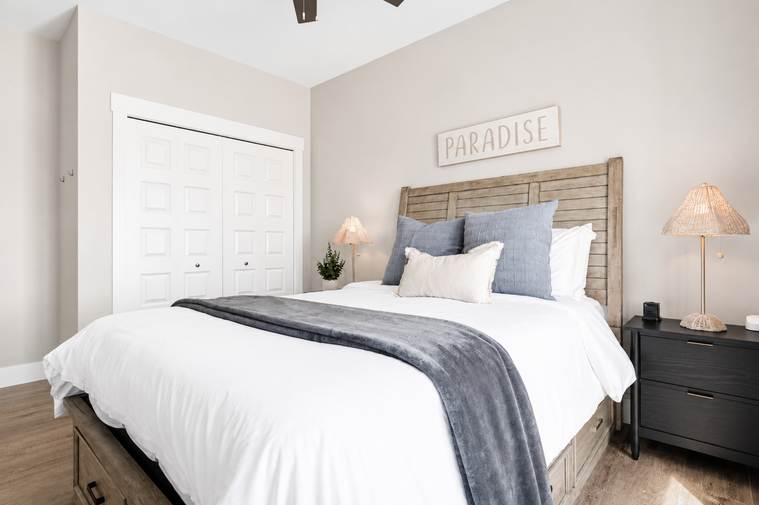 Designed for both comfort and convenience, this bedroom features an adjustable queen bed with built-in storage, bedside lighting, and thoughtful touches to help you settle right in.