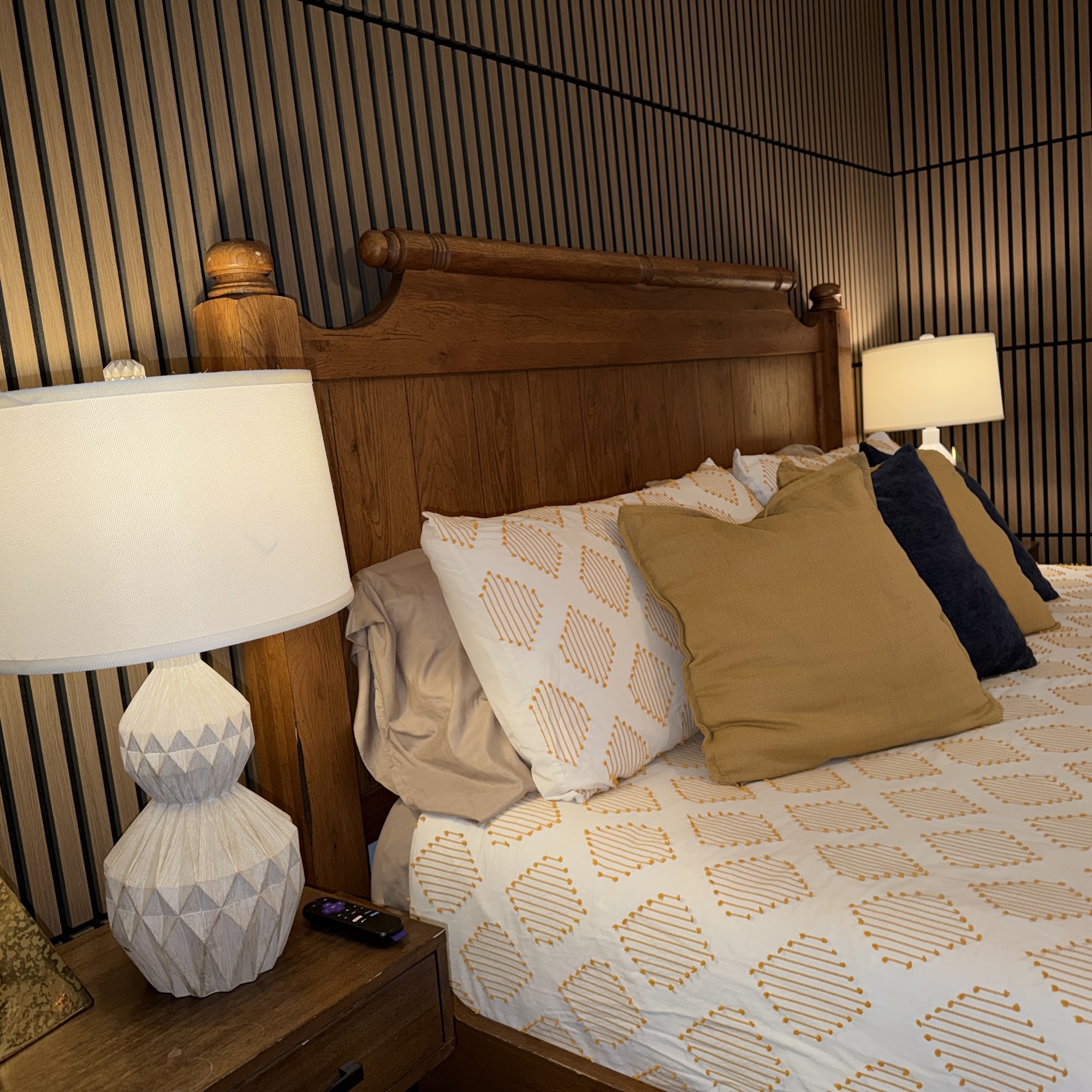 Bedroom 1: king bed, plush pillows and reading lamps