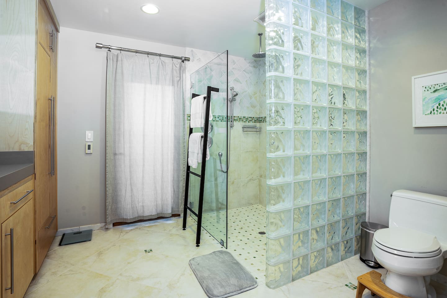 Primary bathroom with walk-in shower.