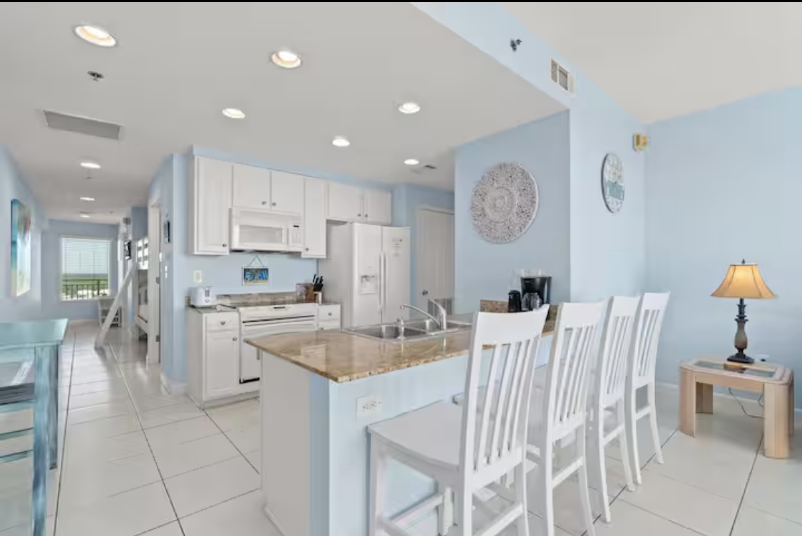 Kitchen area with bar seating