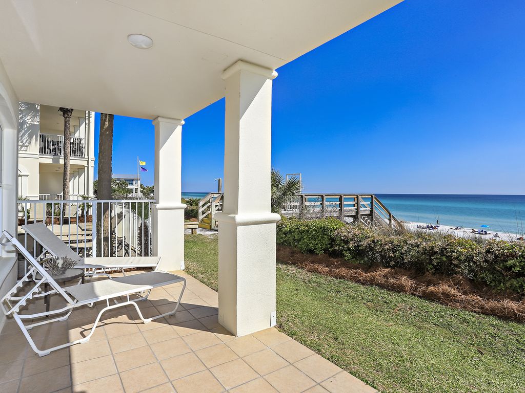 Lounge on your chairs overlooking the Gulf of Mexico and sugary white sand beach