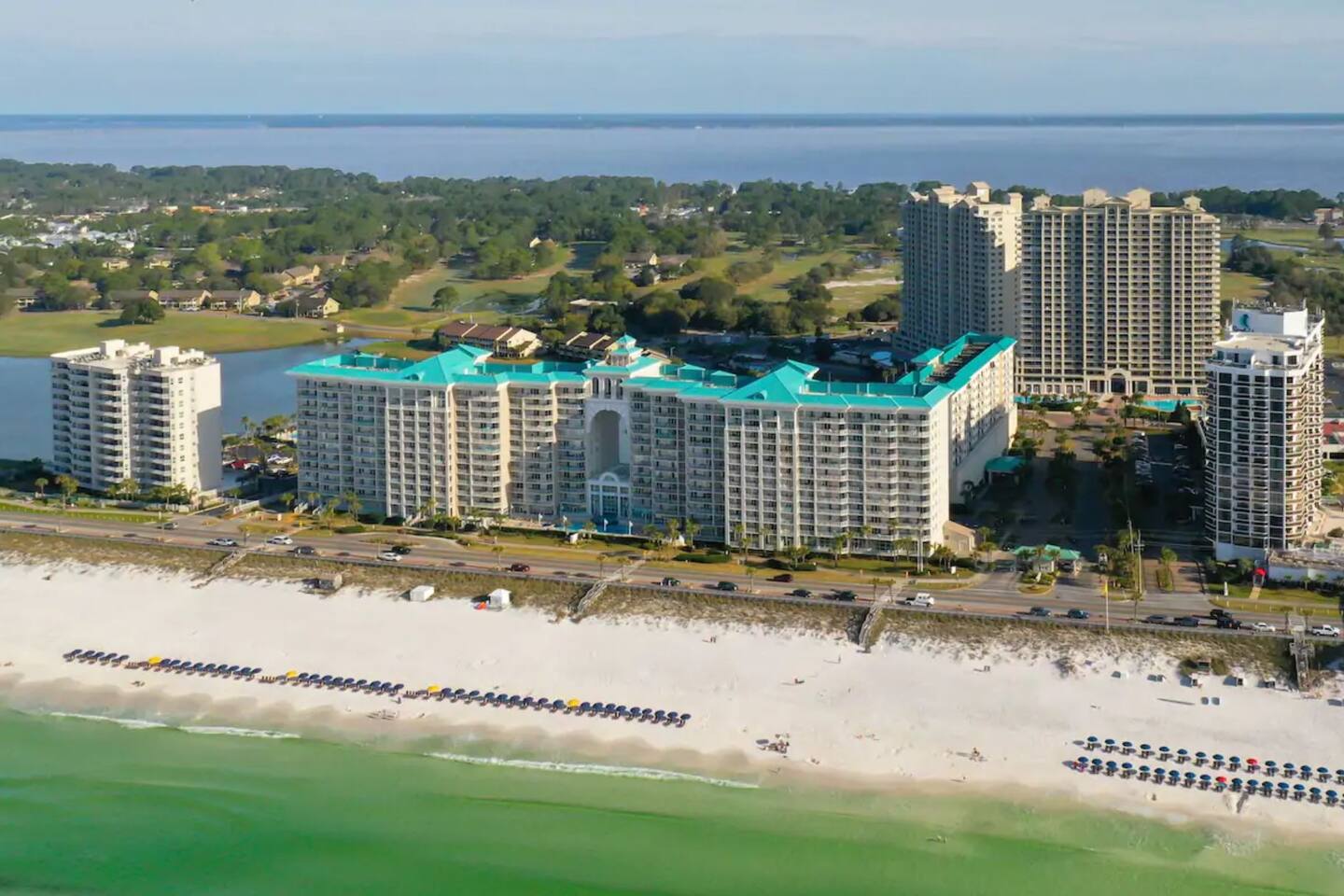 Ariel view of the sprawling Seascape community - beautiful beaches, pools, hot tubs, tennis courts, golf course, shopping, dining, and more - all within walking distance!