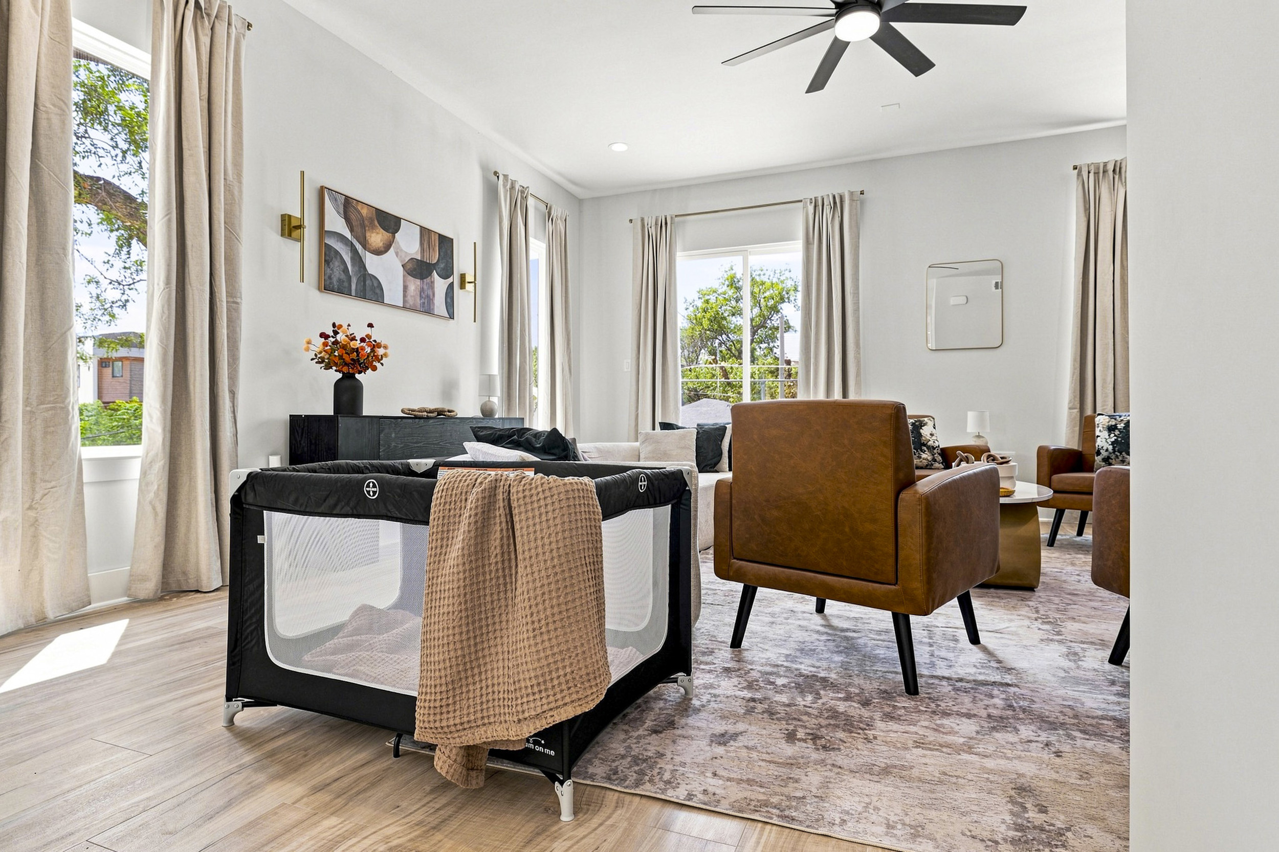 Bright and airy space featuring stylish decor and inviting seating for relaxation!