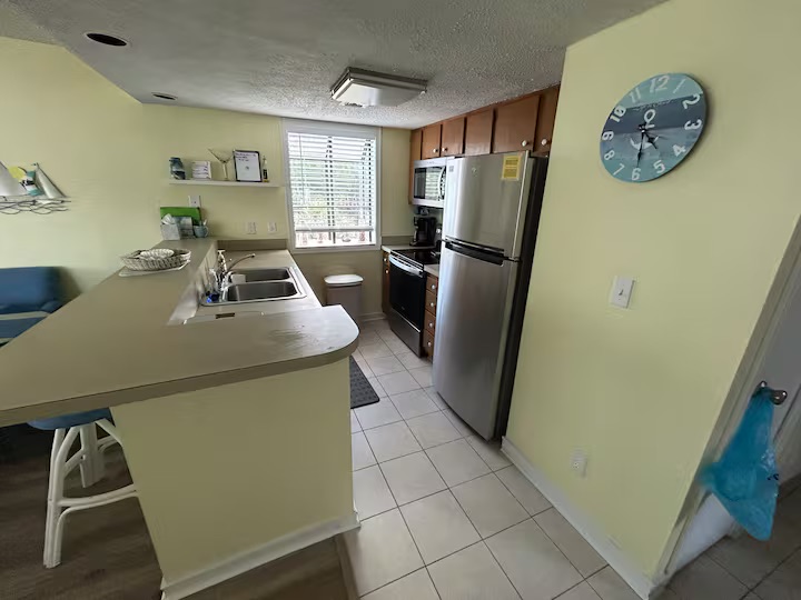 Fully stocked kitchen with stainless steel appliances