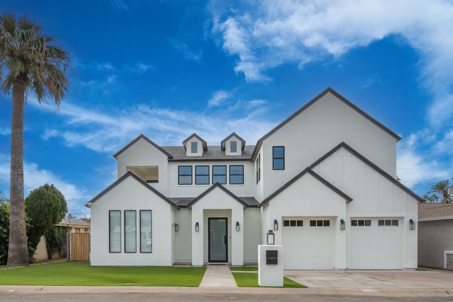 This charming home features a classic exterior that blends elegance and style, creating a welcoming atmosphere.