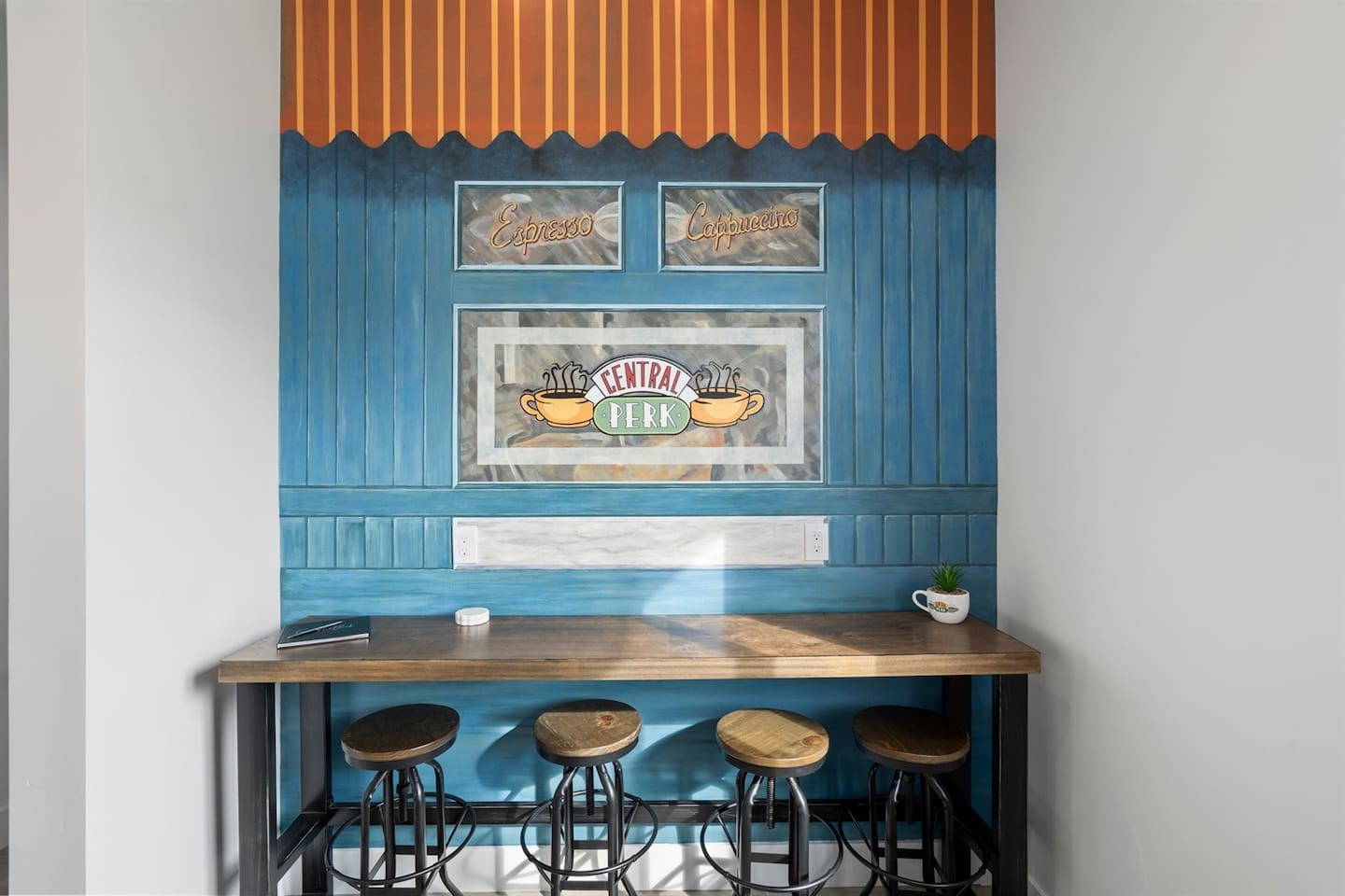 Sip your favorite coffee in a comfy nook featuring seating and a coffee machine—an ideal spot to start your day. Perfect place to plug in and get some work done with electricity plug ins across the wall.