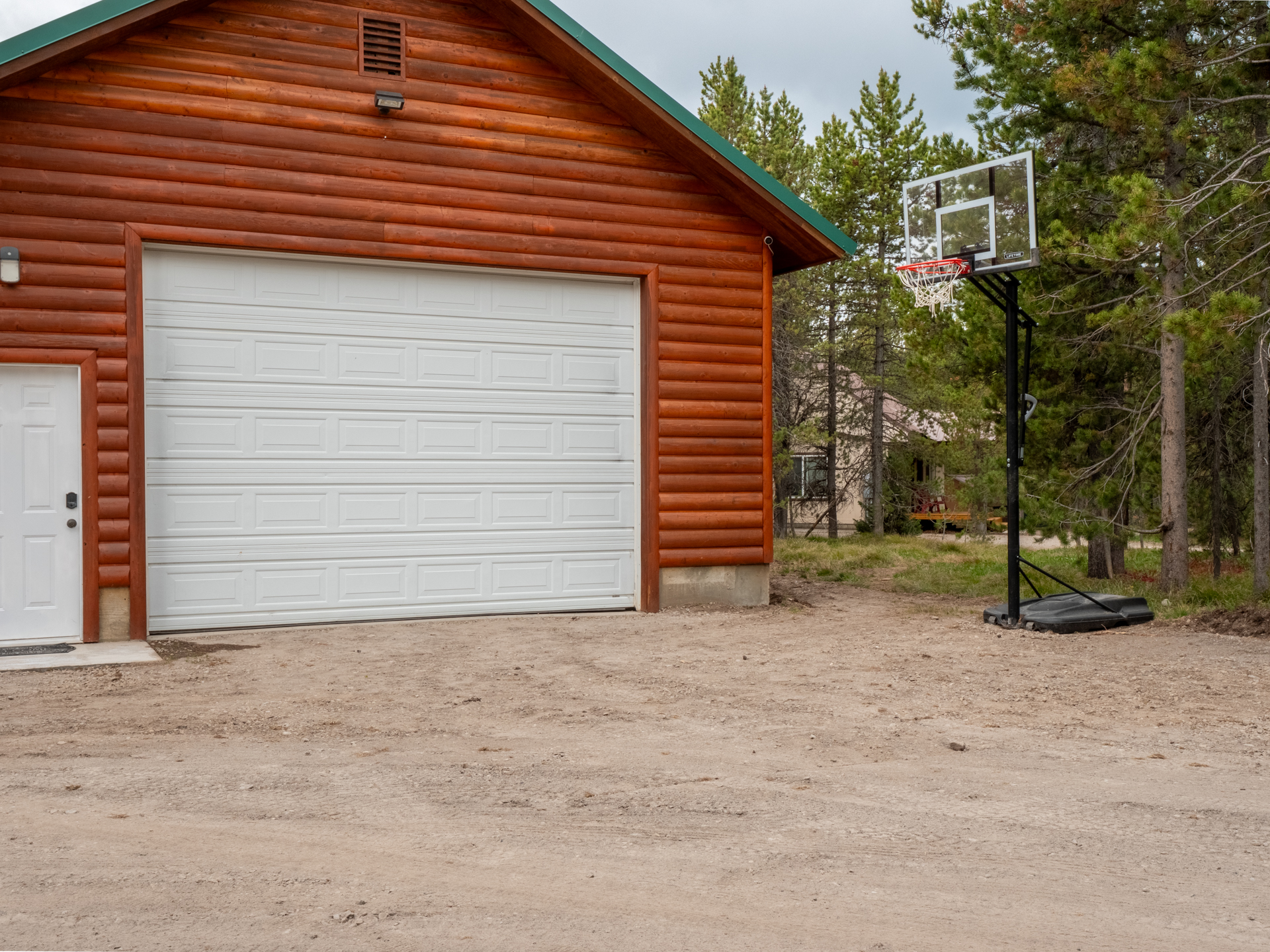 Garage Activity Center, Outside Basketball, Path to our neighboring Cabin for Reunions