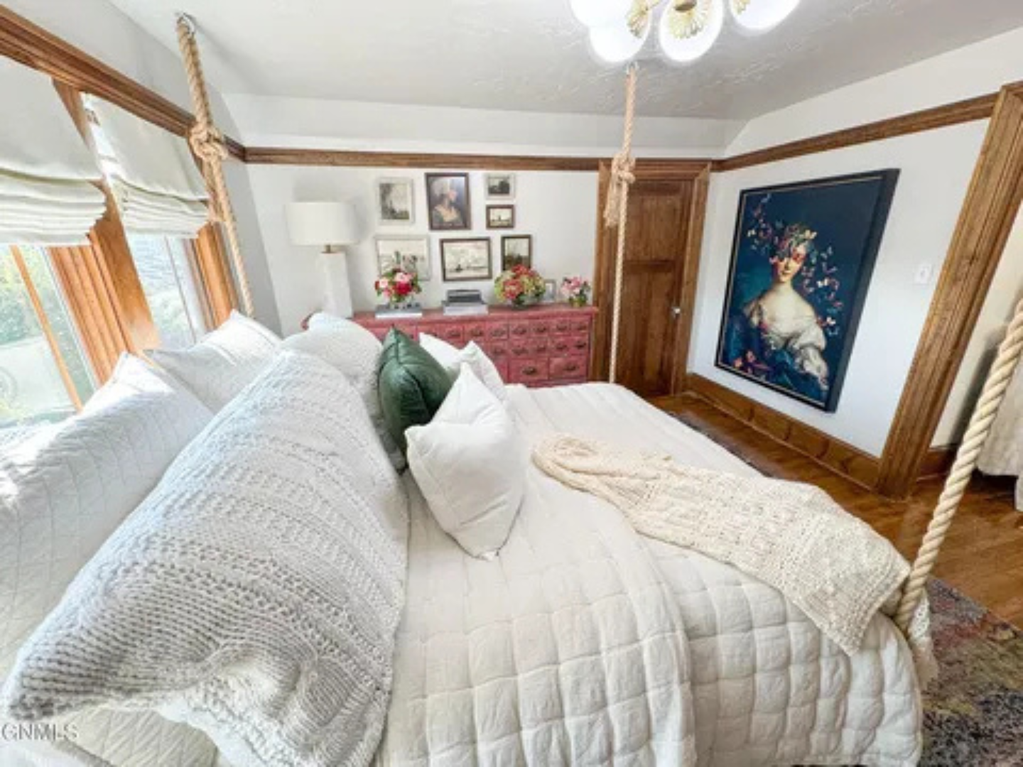 This room feels warm and inviting, with a bed you’ll want to sink right into.