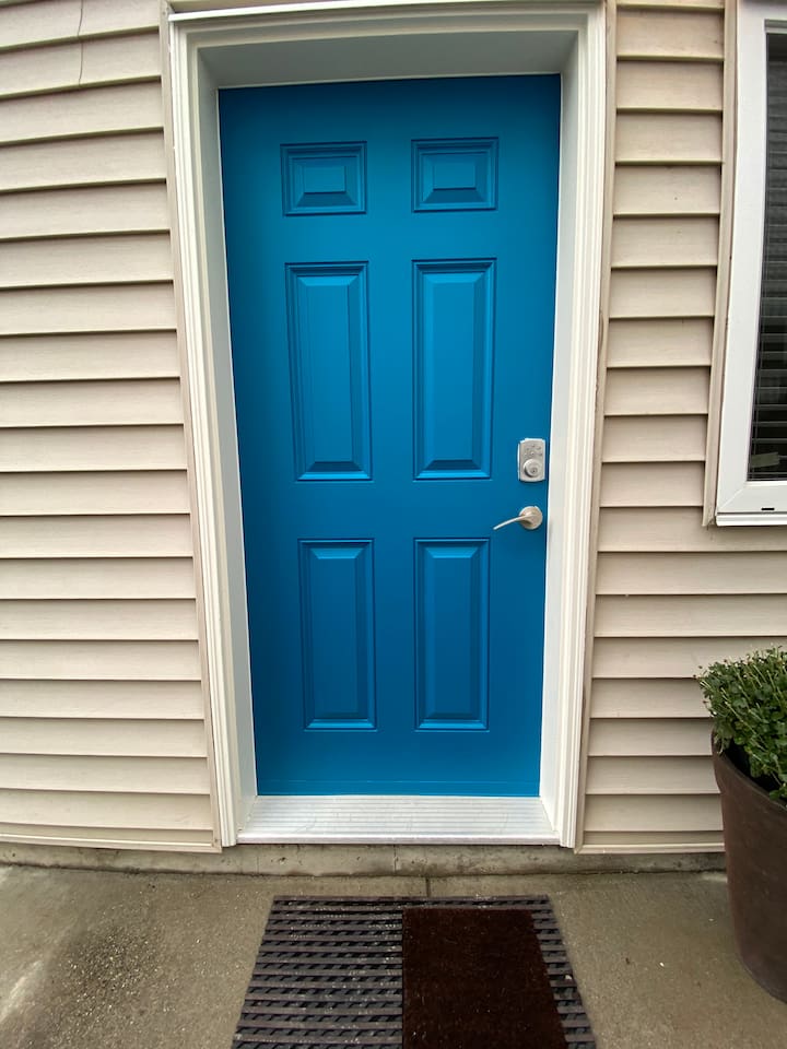 Front door one step up into the suite 