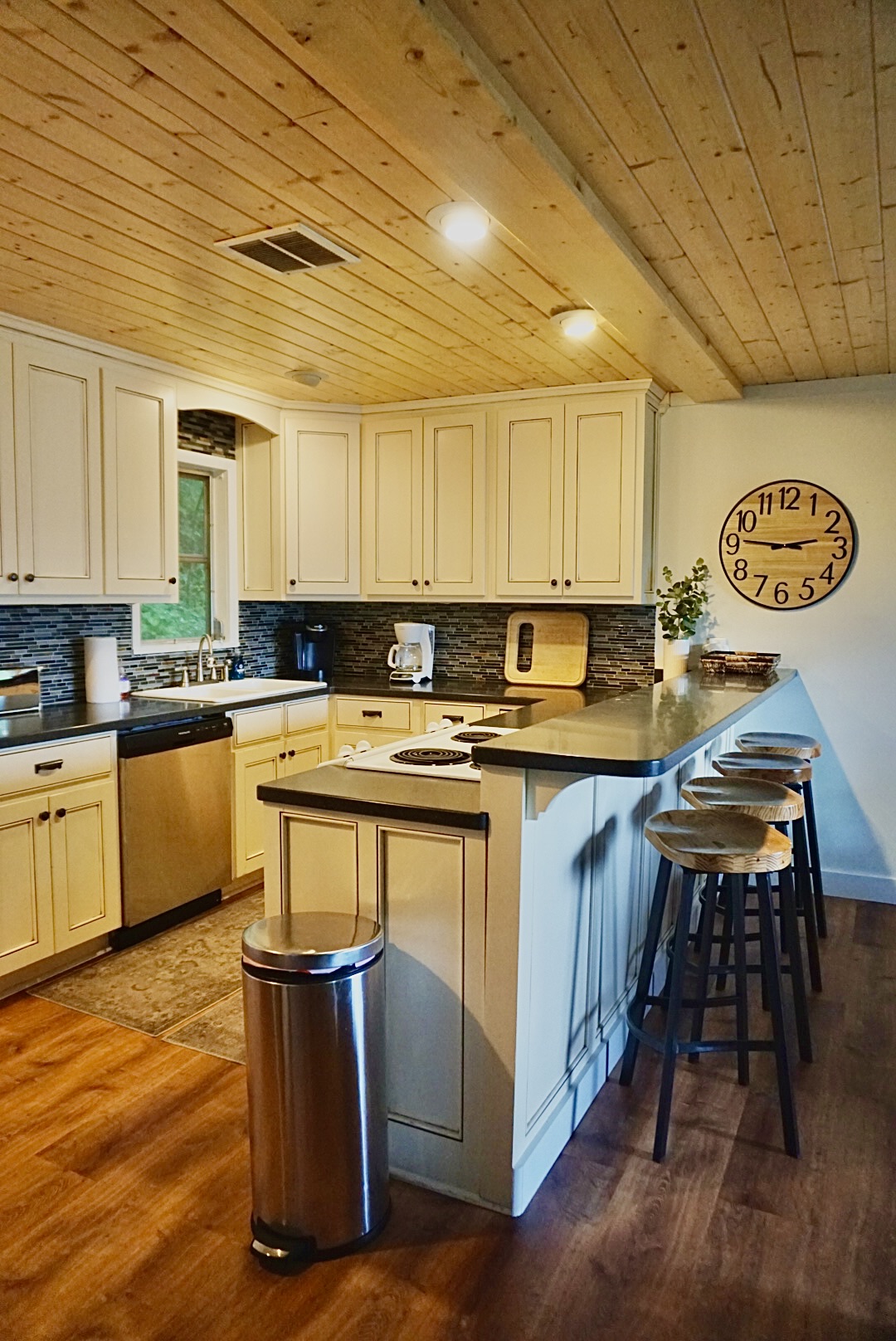 Kitchen Oasis: Enjoy cooking in this stylish kitchen with modern appliances and inviting bar seating!