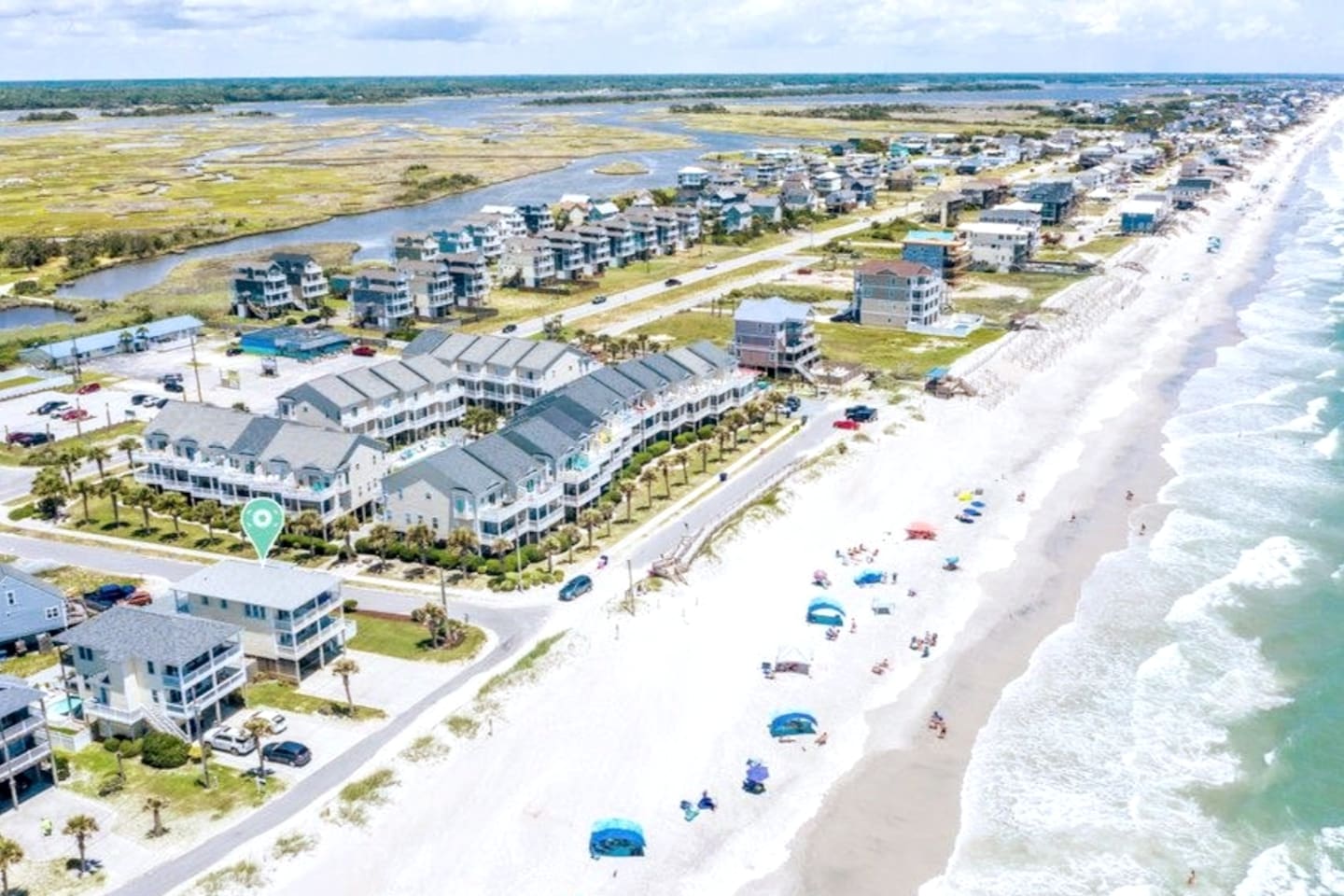 Arieal view of our house and beach access. Beach access located at the road crossing where the blue car is.