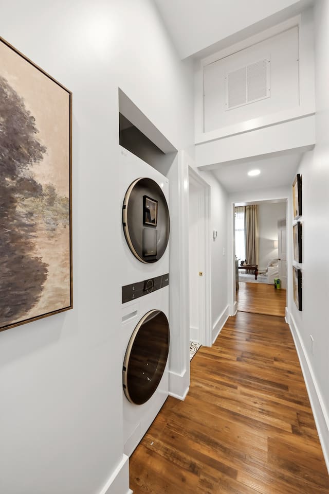 New full-sized stacked washer and dryer in each unit