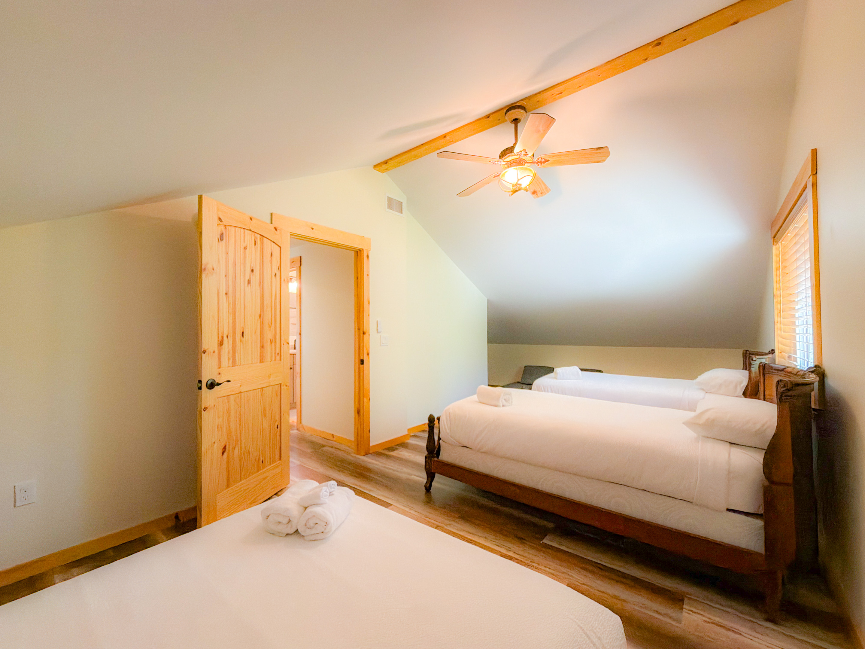 1 Queen and two twin beds in the Caboose themed room. Perfect for the kiddos!