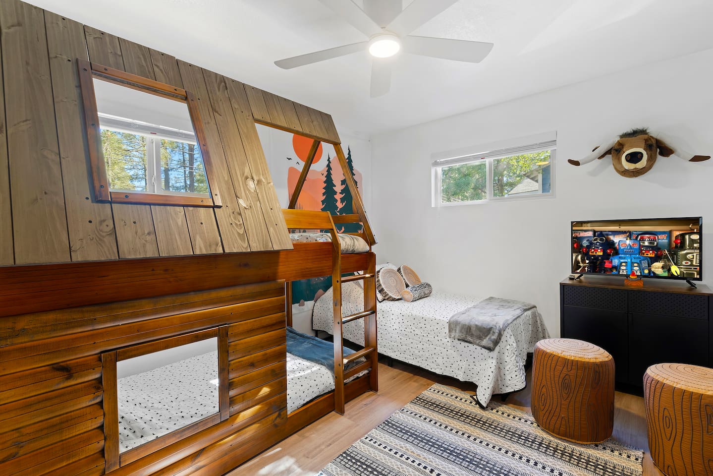 A cabin bunk and another single bed, perfect for the little ones to enjoy their sleep.