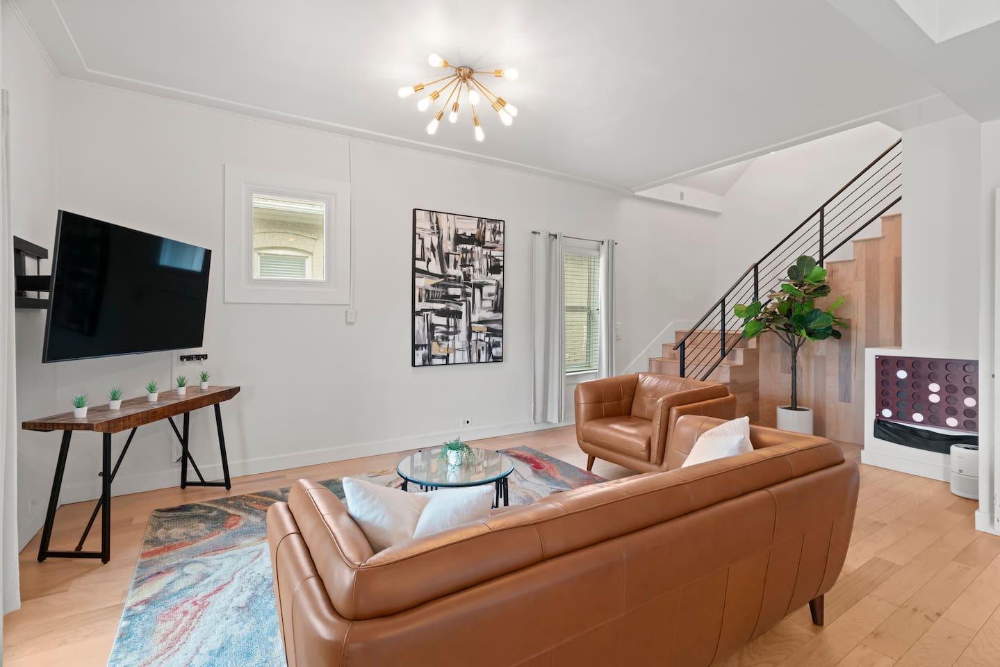 Modern elegance meets cozy comfort—this living room is the perfect blend of style and warmth.