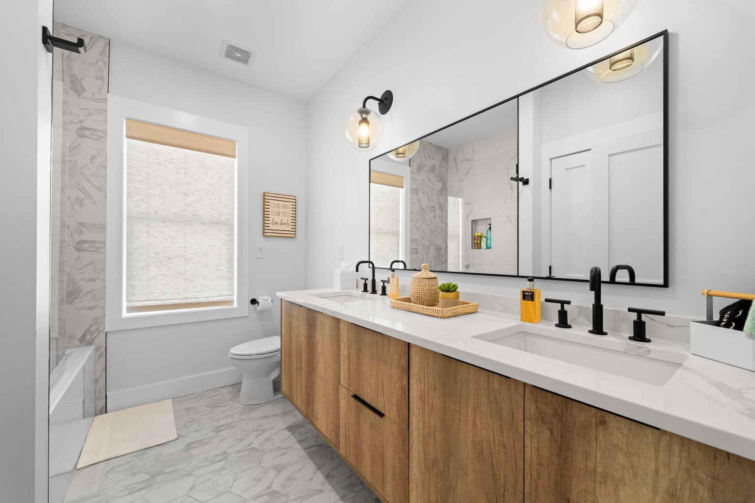 Hall Bathroom - shared by bunk room and queen bedroom upstairs.