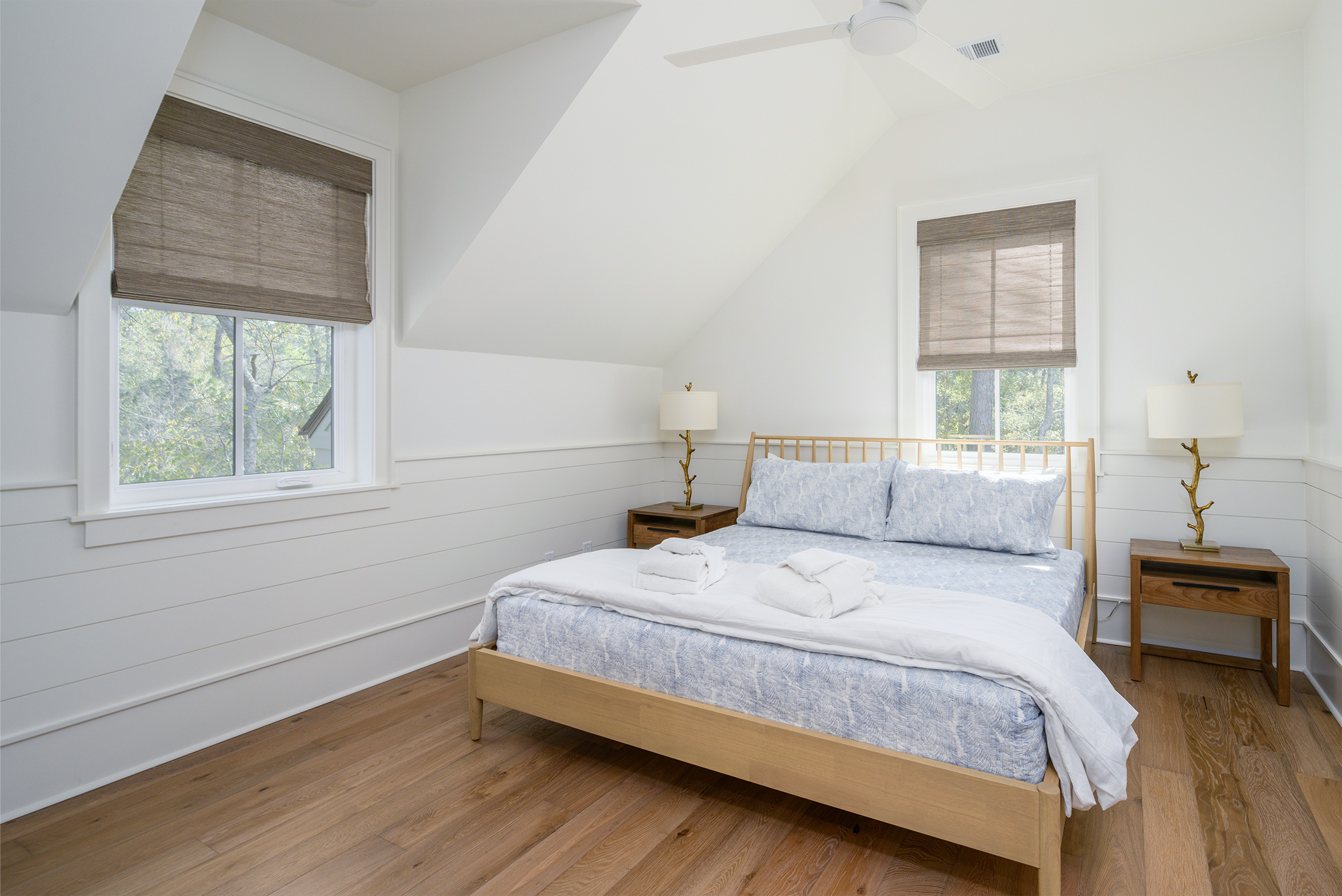 Upstairs front corner bedroom features a king bed