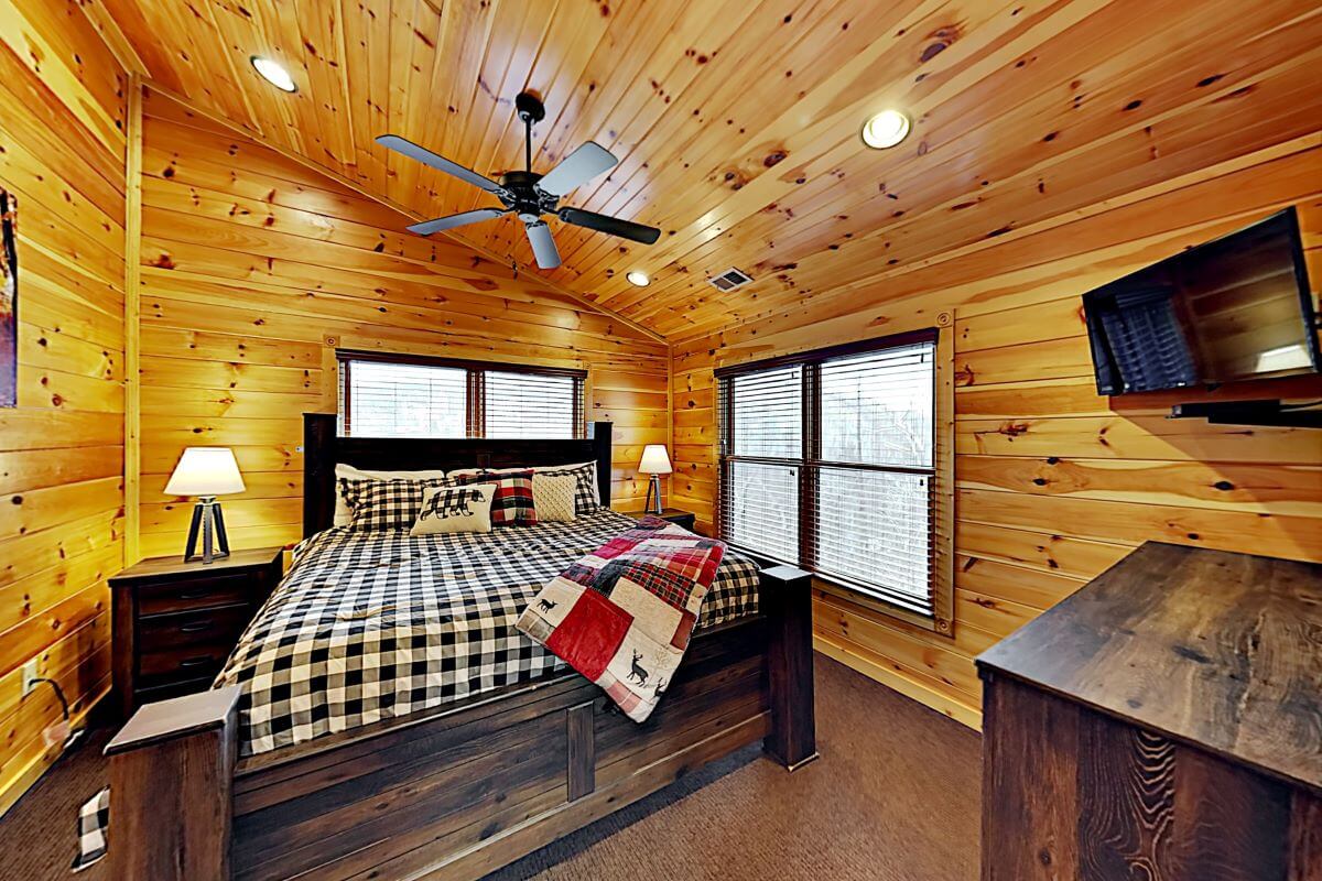 Cozy bedroom with closet and dresser.