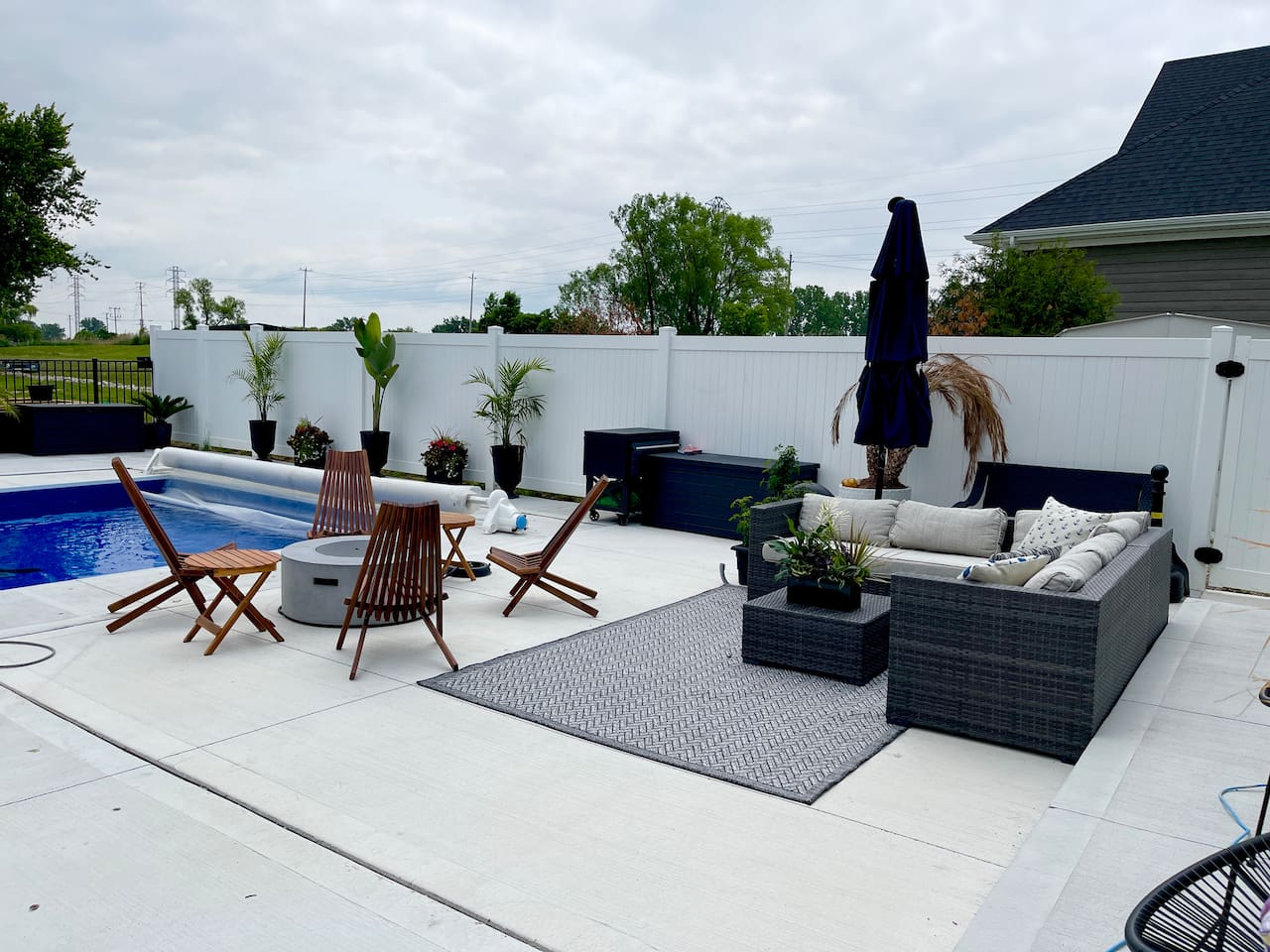 Pool sitting area with fireplace