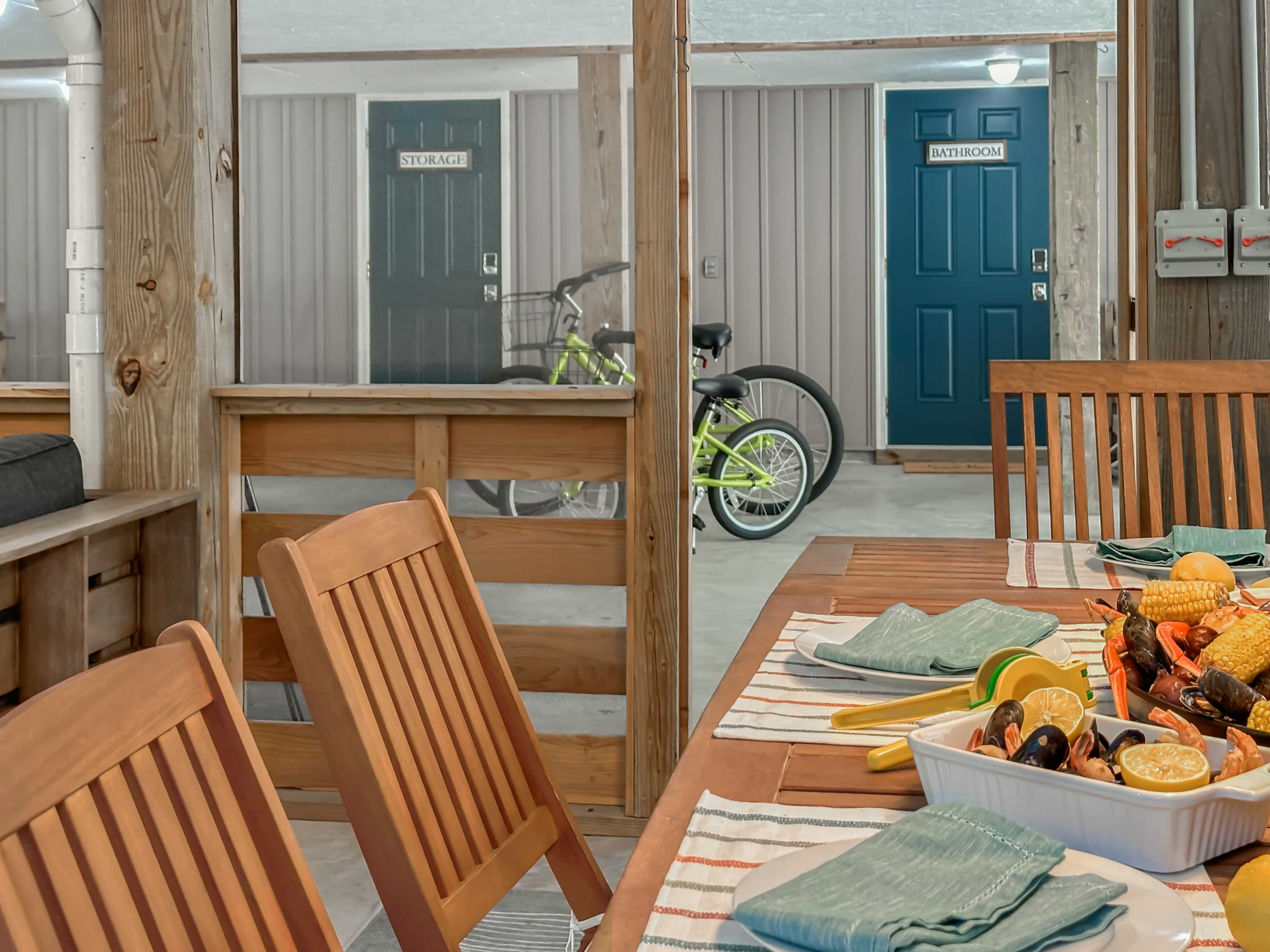 Across from the half bath, you'll find the ultimate screened in porch...