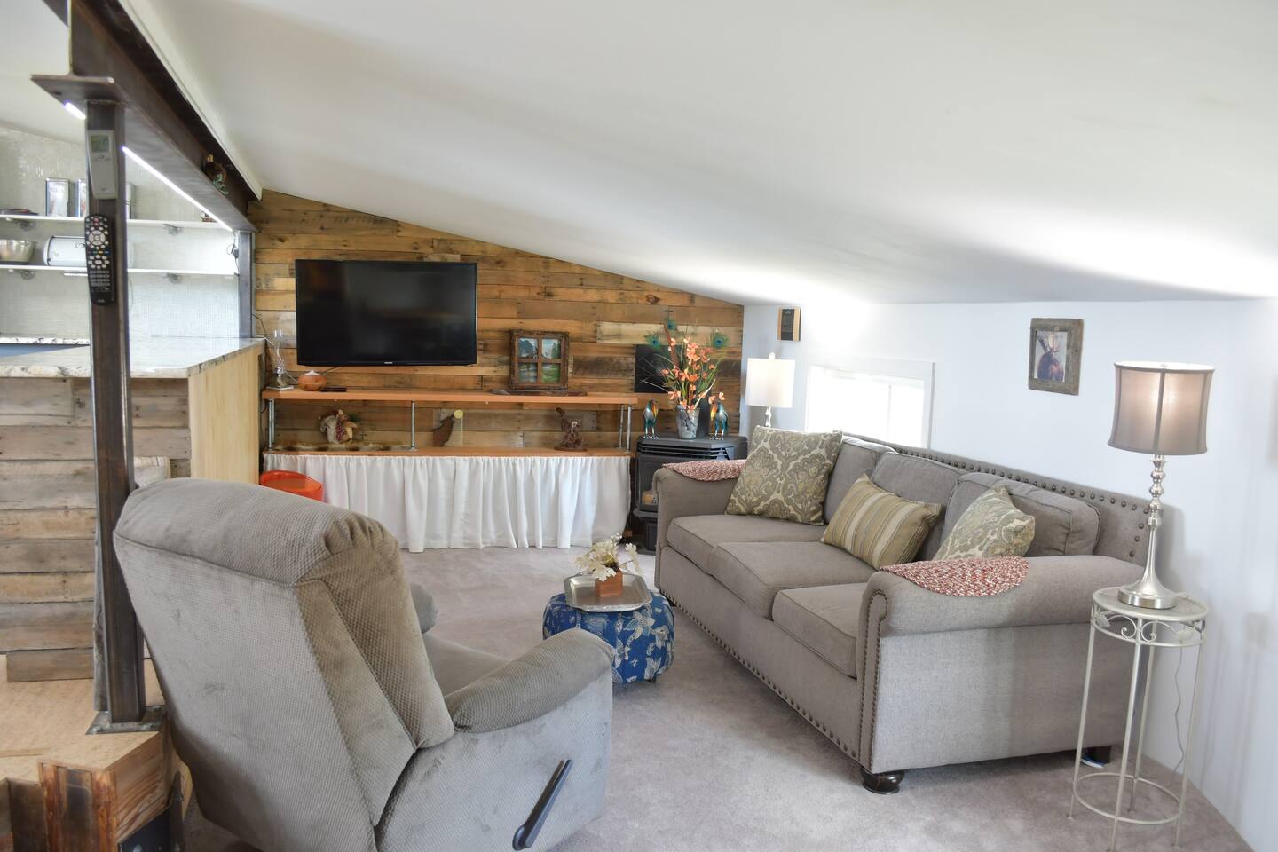 Living Room, with a couch that does turn into a twin bed if needed