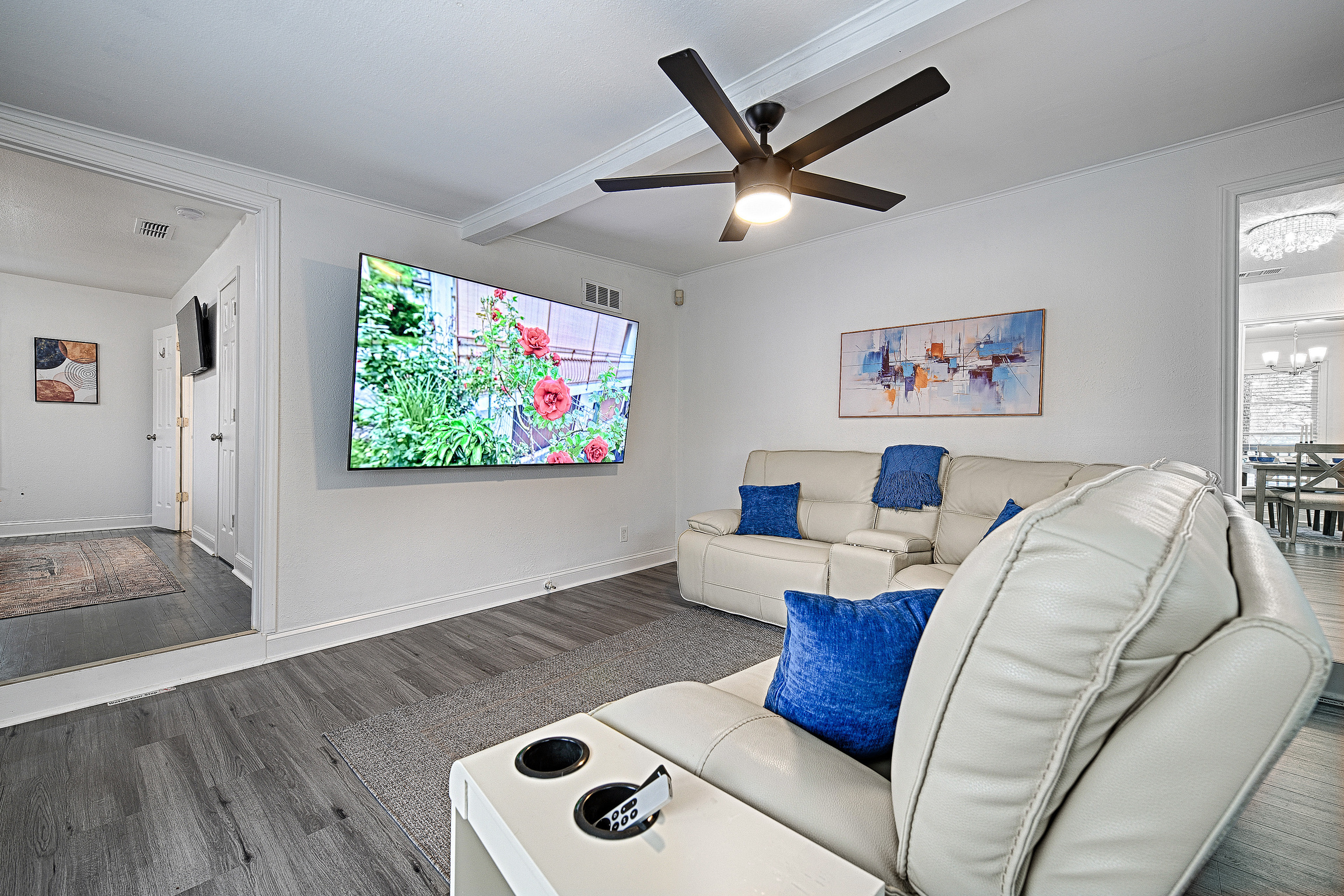 Living Room with Sectional and Large Screen TV