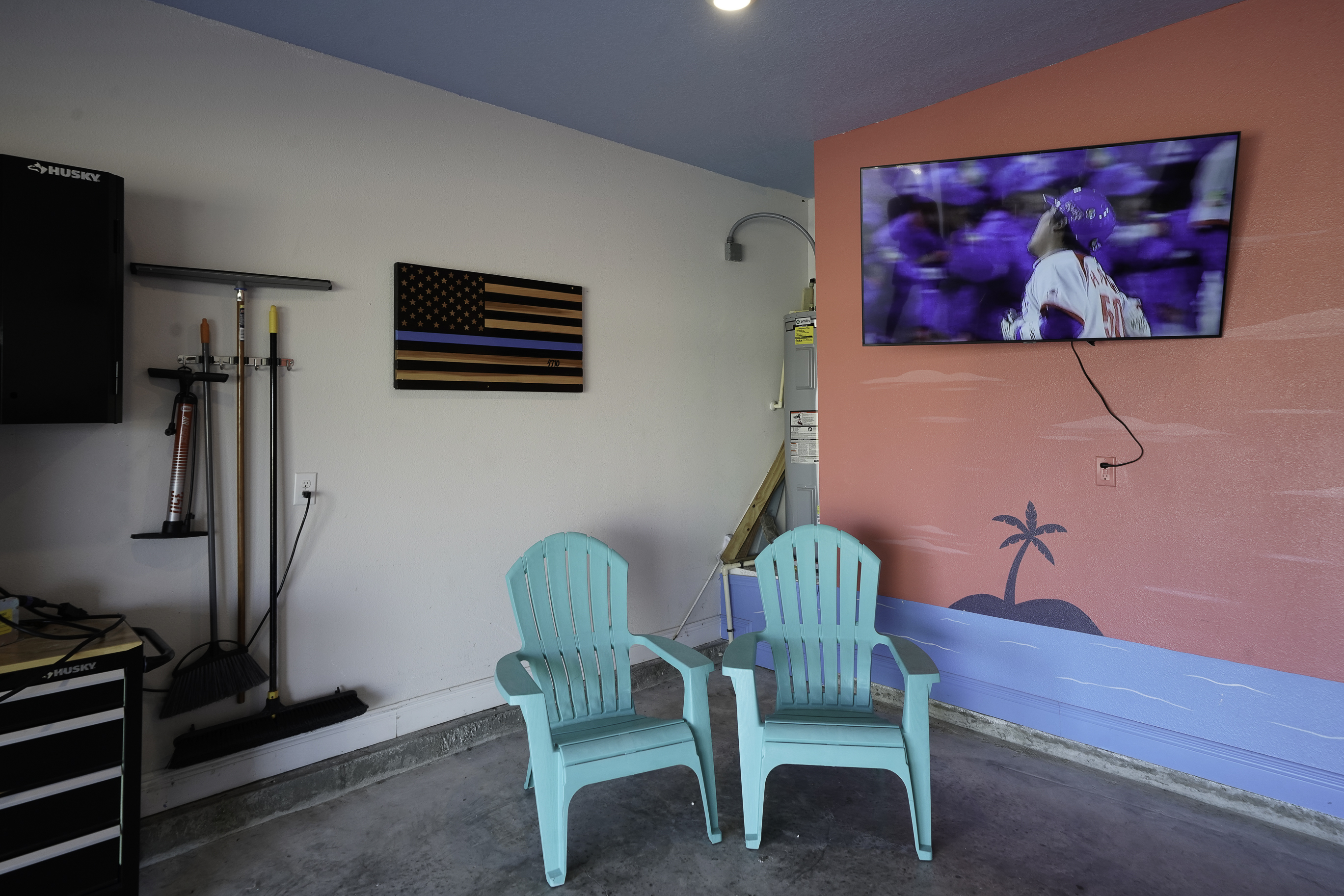 Spend time in the garage with arcade games, a TV, and seating for friends or family.